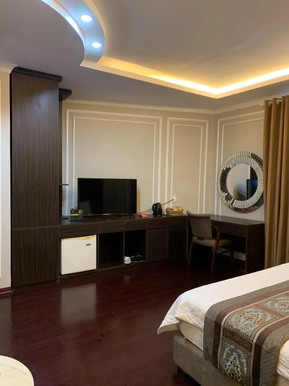 Living room, Bed in Holiday Hotel