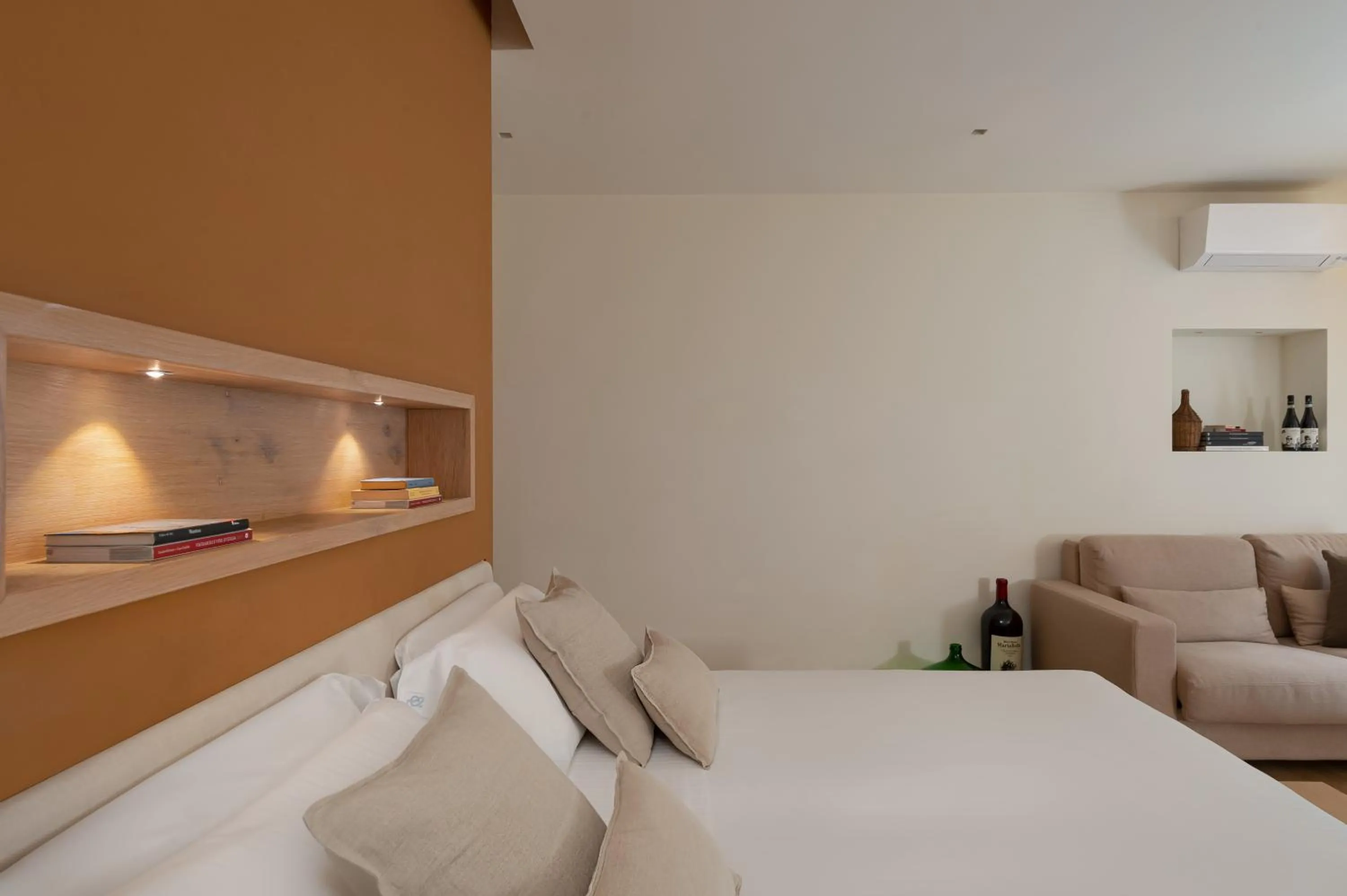 Bed in Massimago Wine Suites