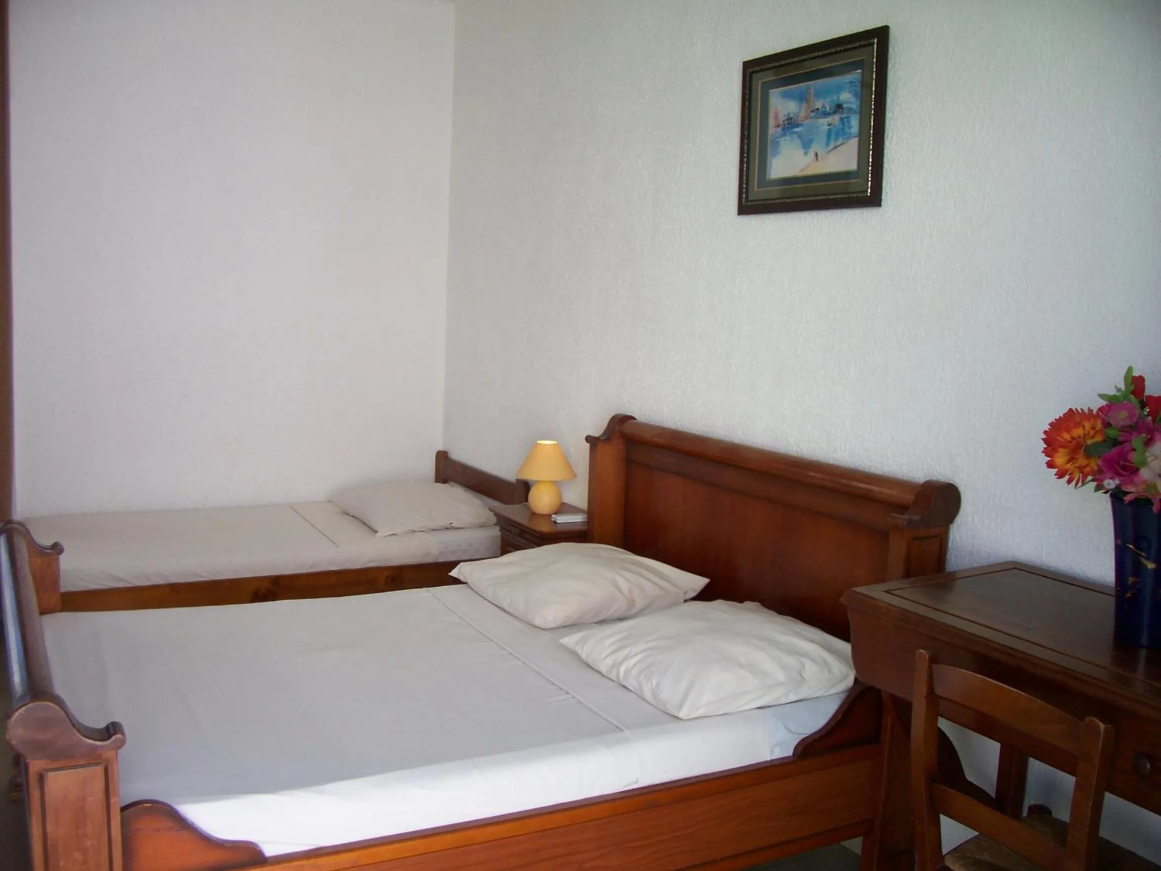 Bed in Hôtel Le Nathania