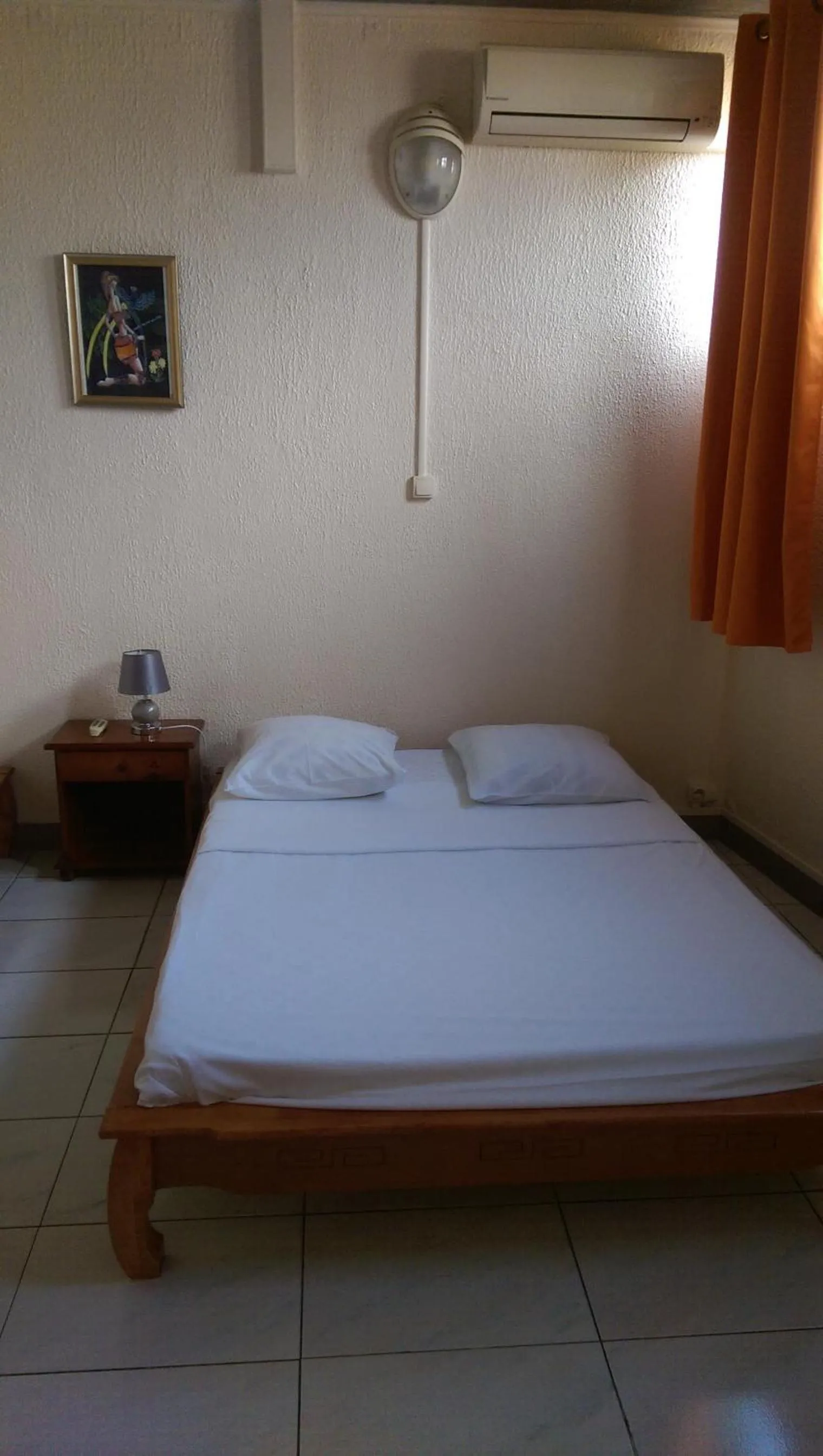 Bed in Hôtel Le Nathania