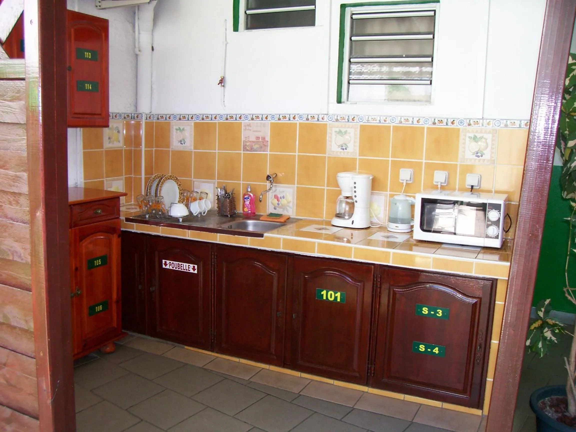 Kitchen or kitchenette in Hôtel Le Nathania