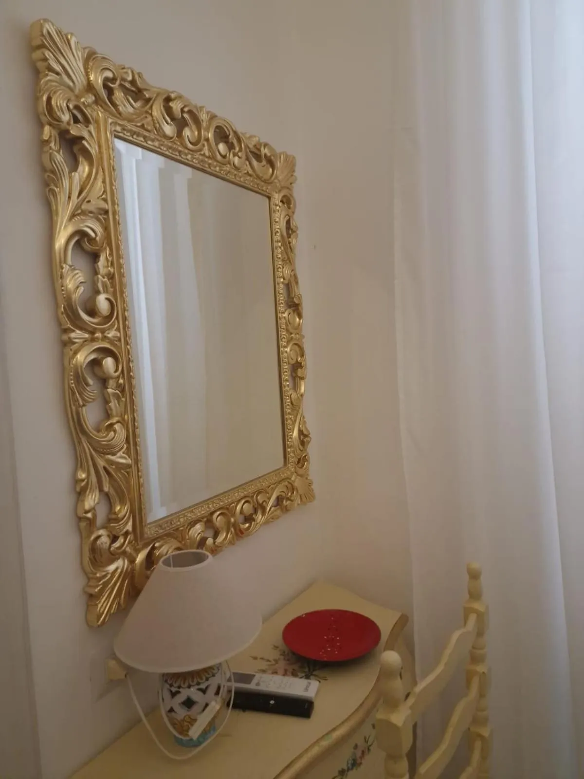 Bedroom in Hotel La Perla