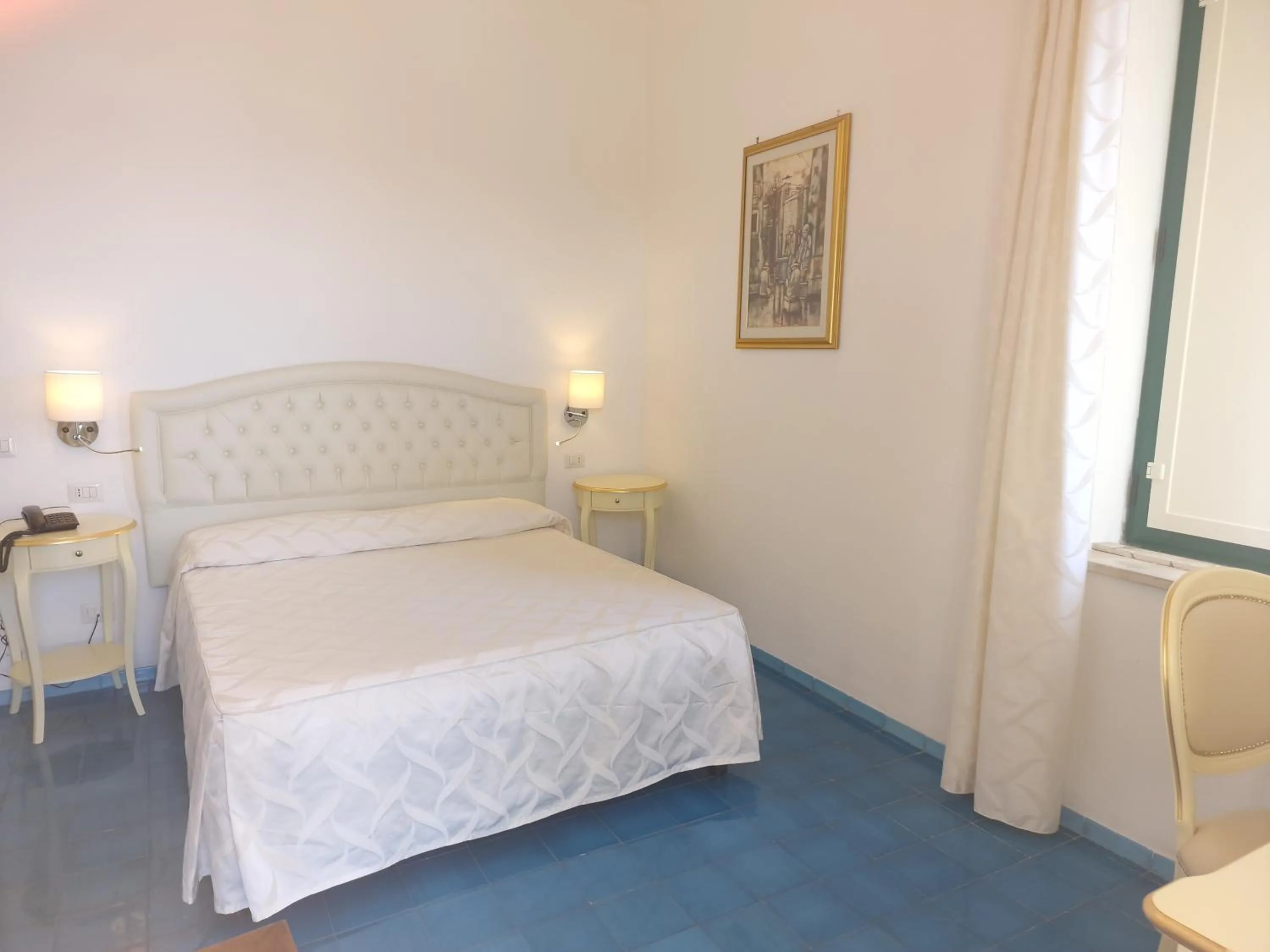 Bed in Hotel La Perla