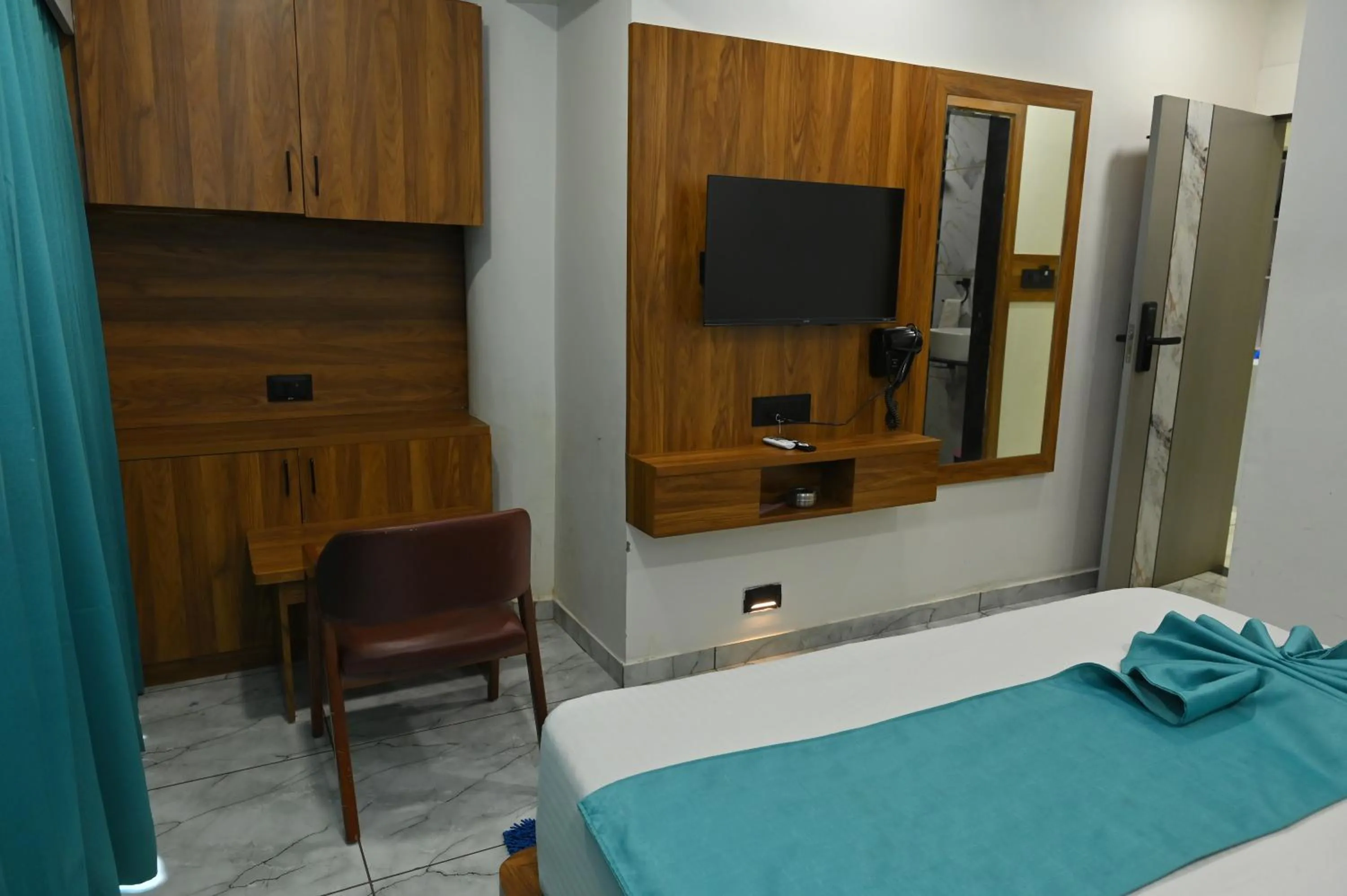 Bedroom in Hotel Revanta Inn