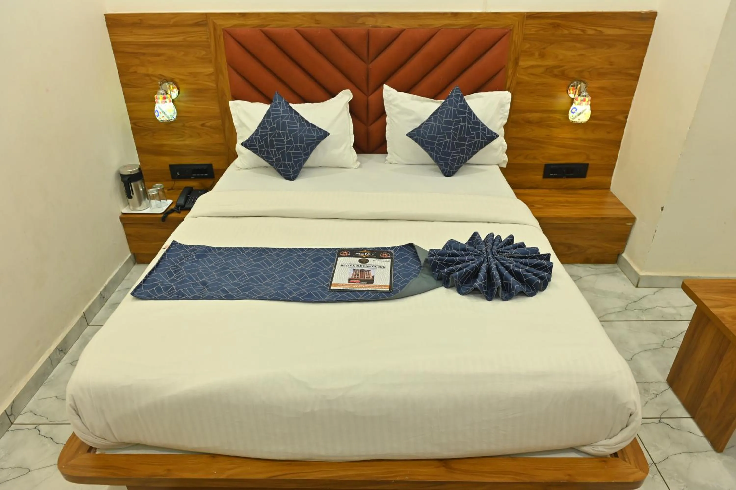 Bedroom in Hotel Revanta Inn