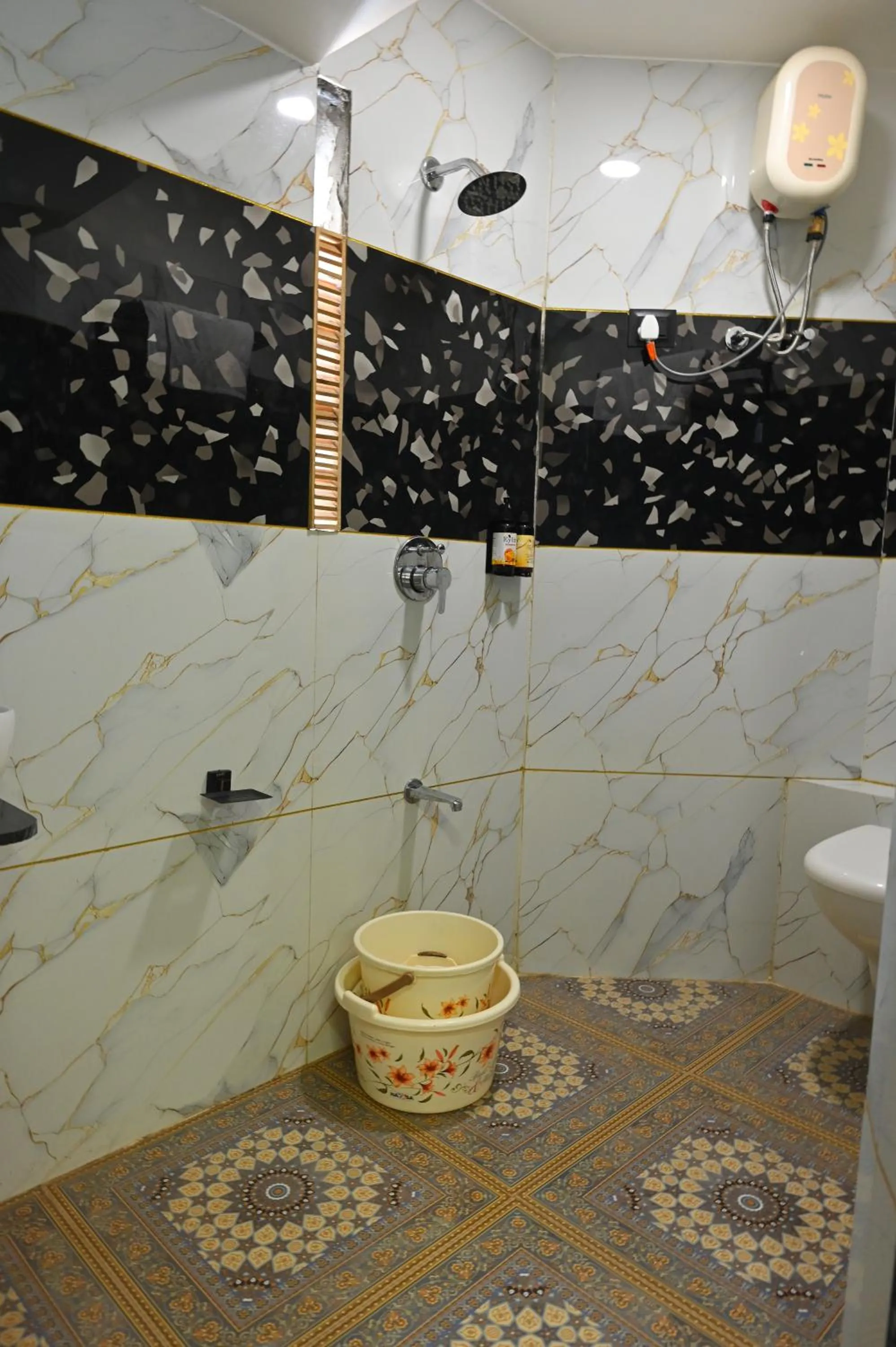 Bathroom in Hotel Revanta Inn