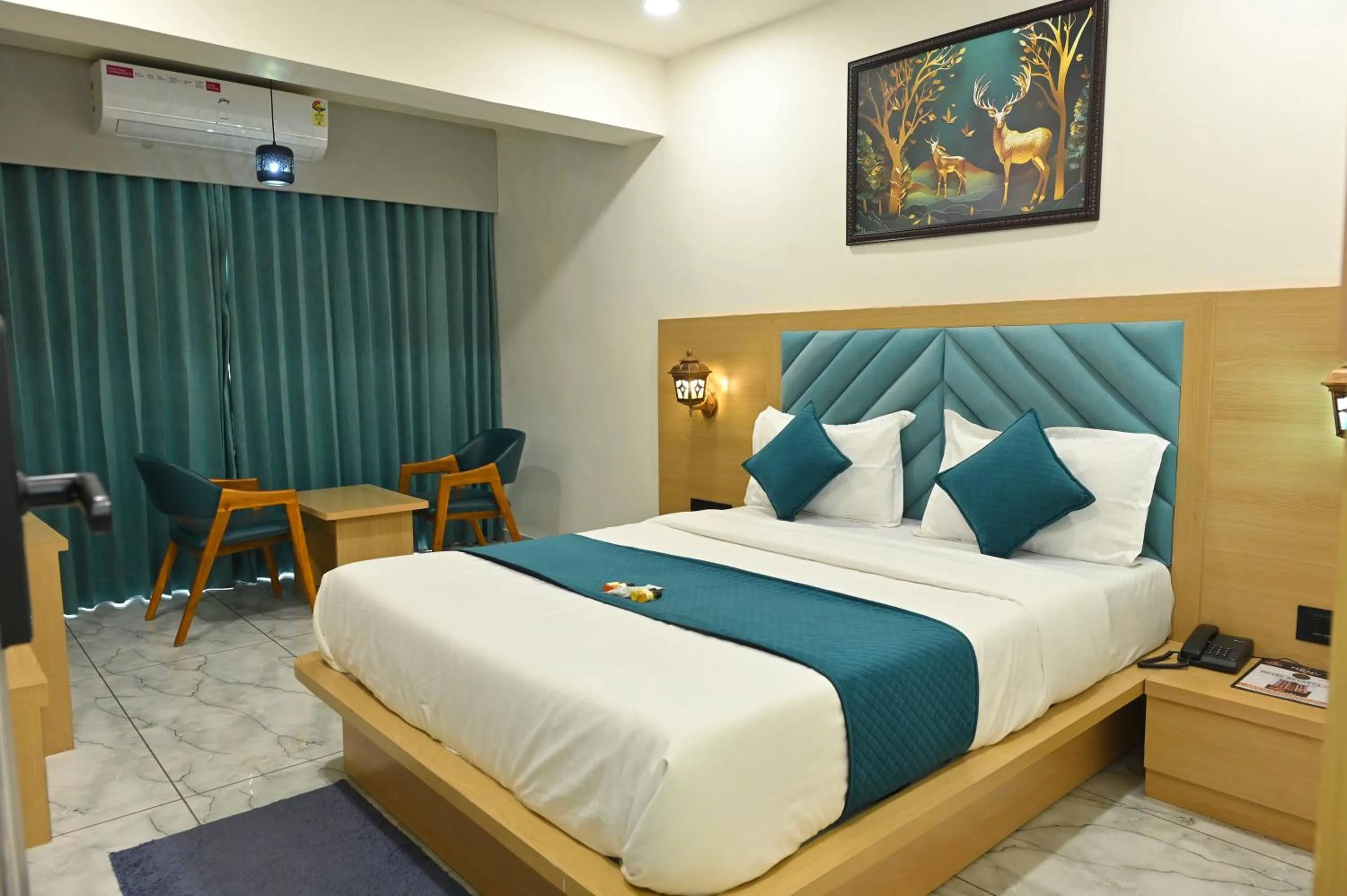Bedroom in Hotel Revanta Inn