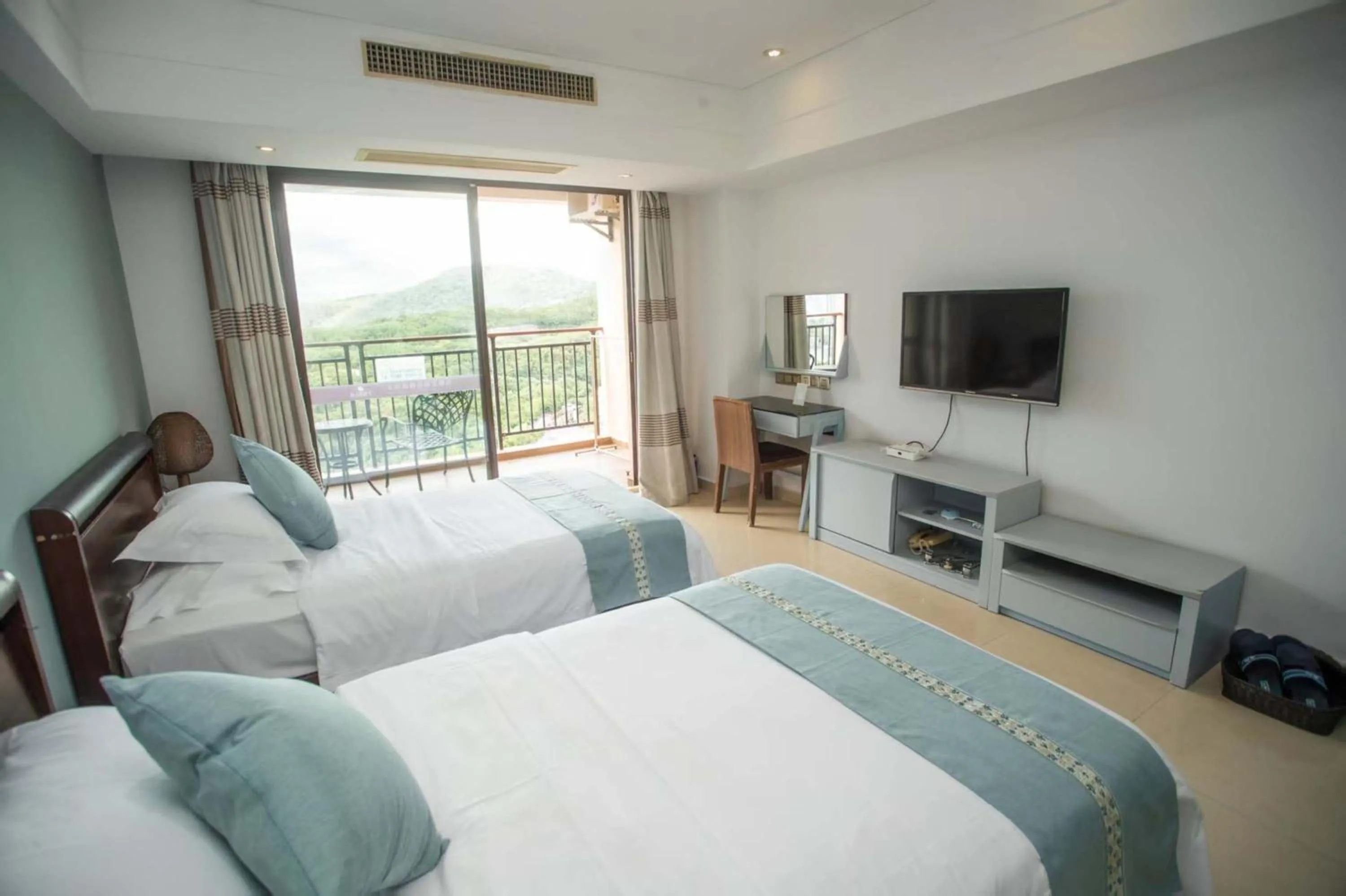 Bed in Sanya Xintai Seaview Hotel