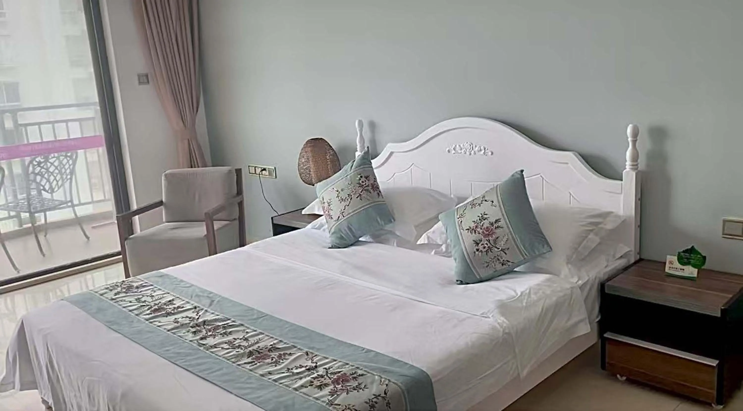 Bed in Sanya Xintai Seaview Hotel