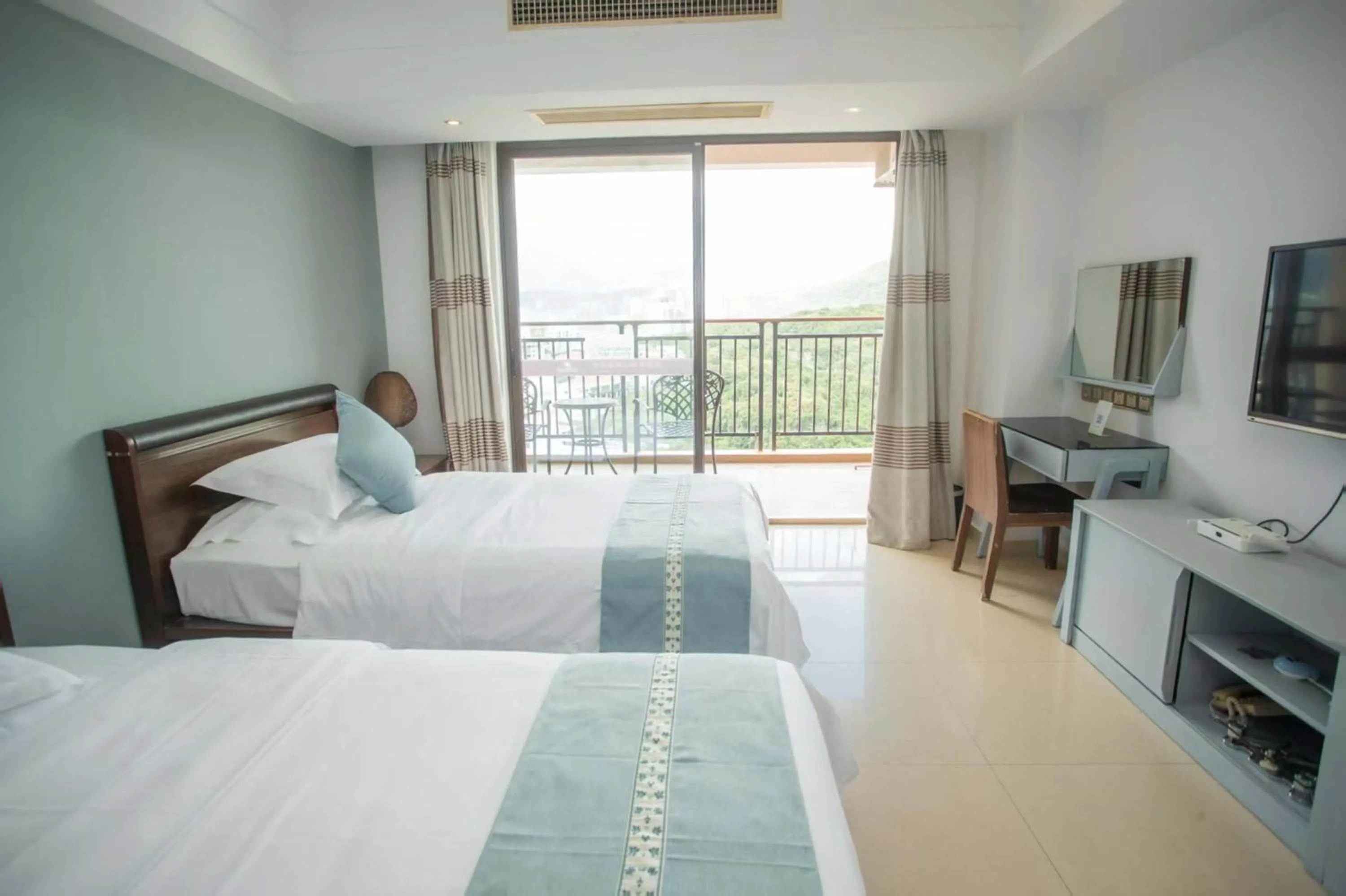 Bedroom, Bed in Sanya Xintai Seaview Hotel