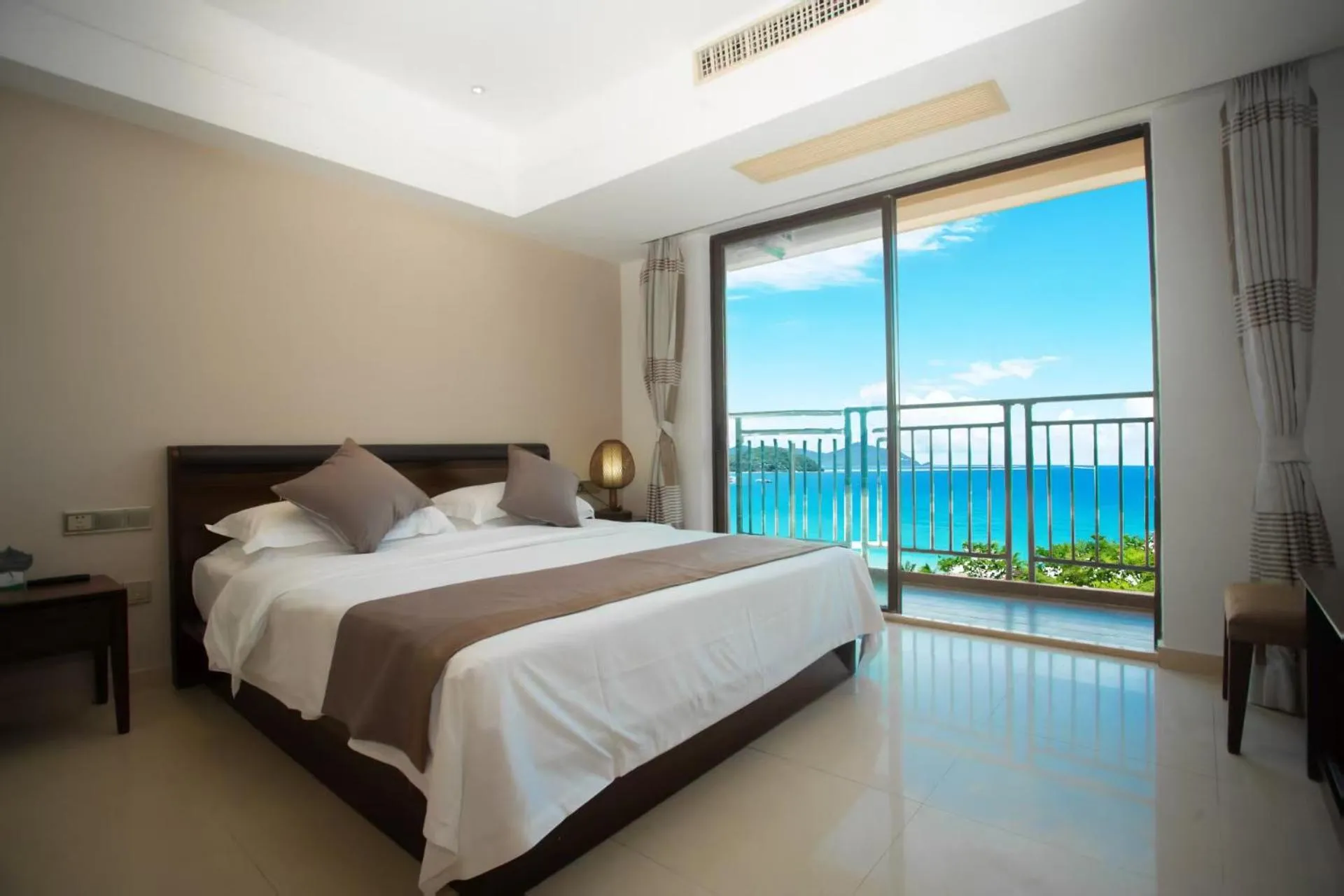 View (from property/room), Bed in Sanya Xintai Seaview Hotel