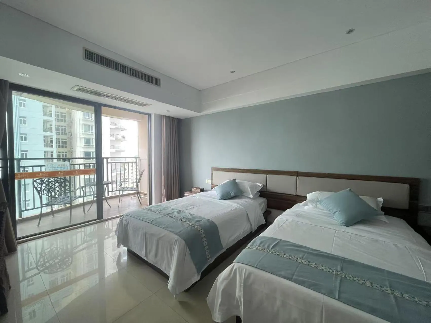 Bed in Sanya Xintai Seaview Hotel
