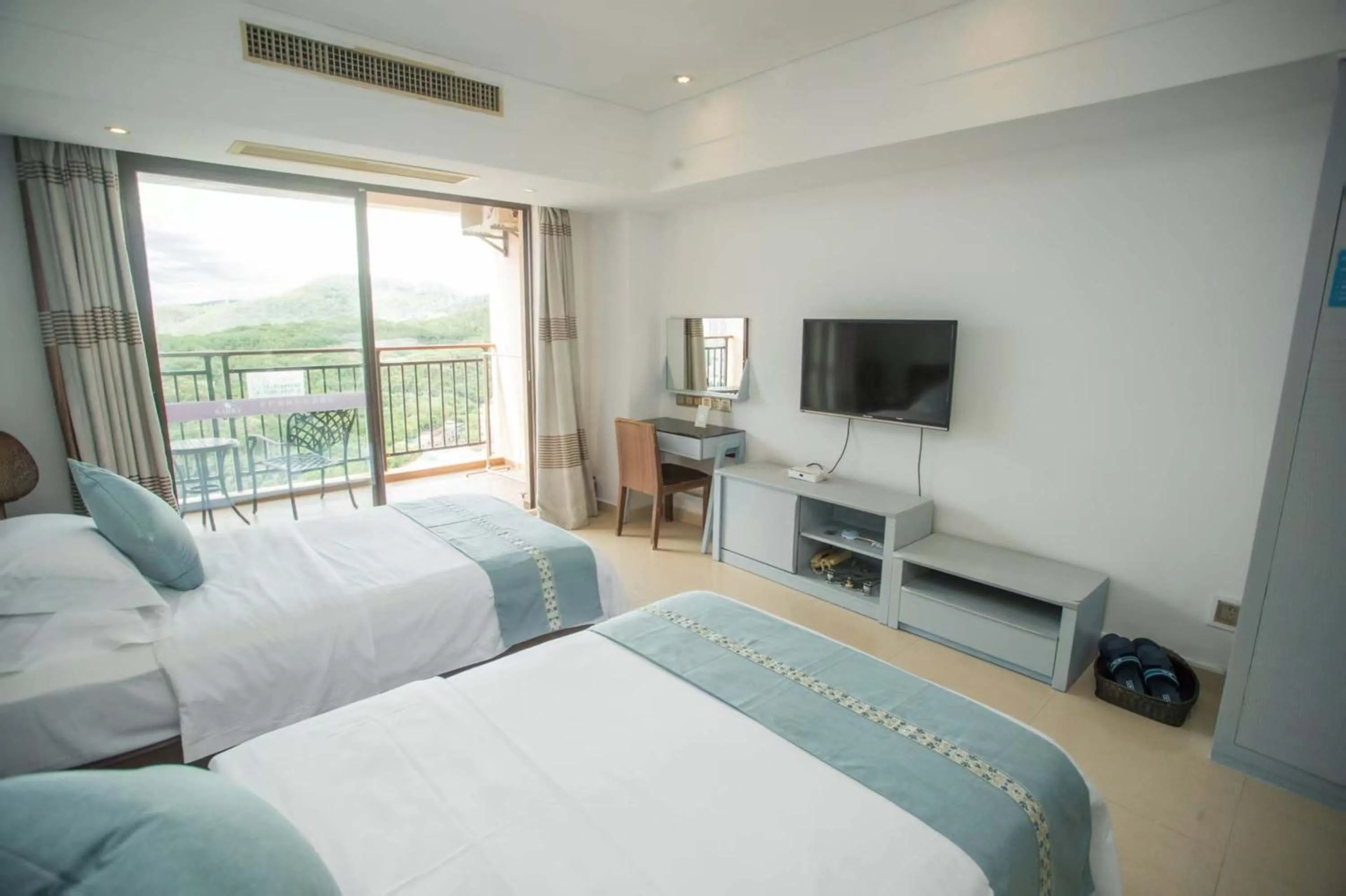 Bed in Sanya Xintai Seaview Hotel