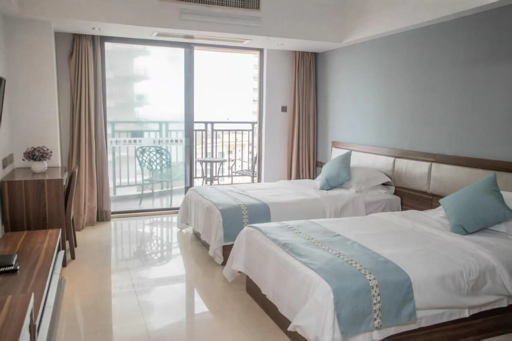 View (from property/room), Bed in Sanya Xintai Seaview Hotel
