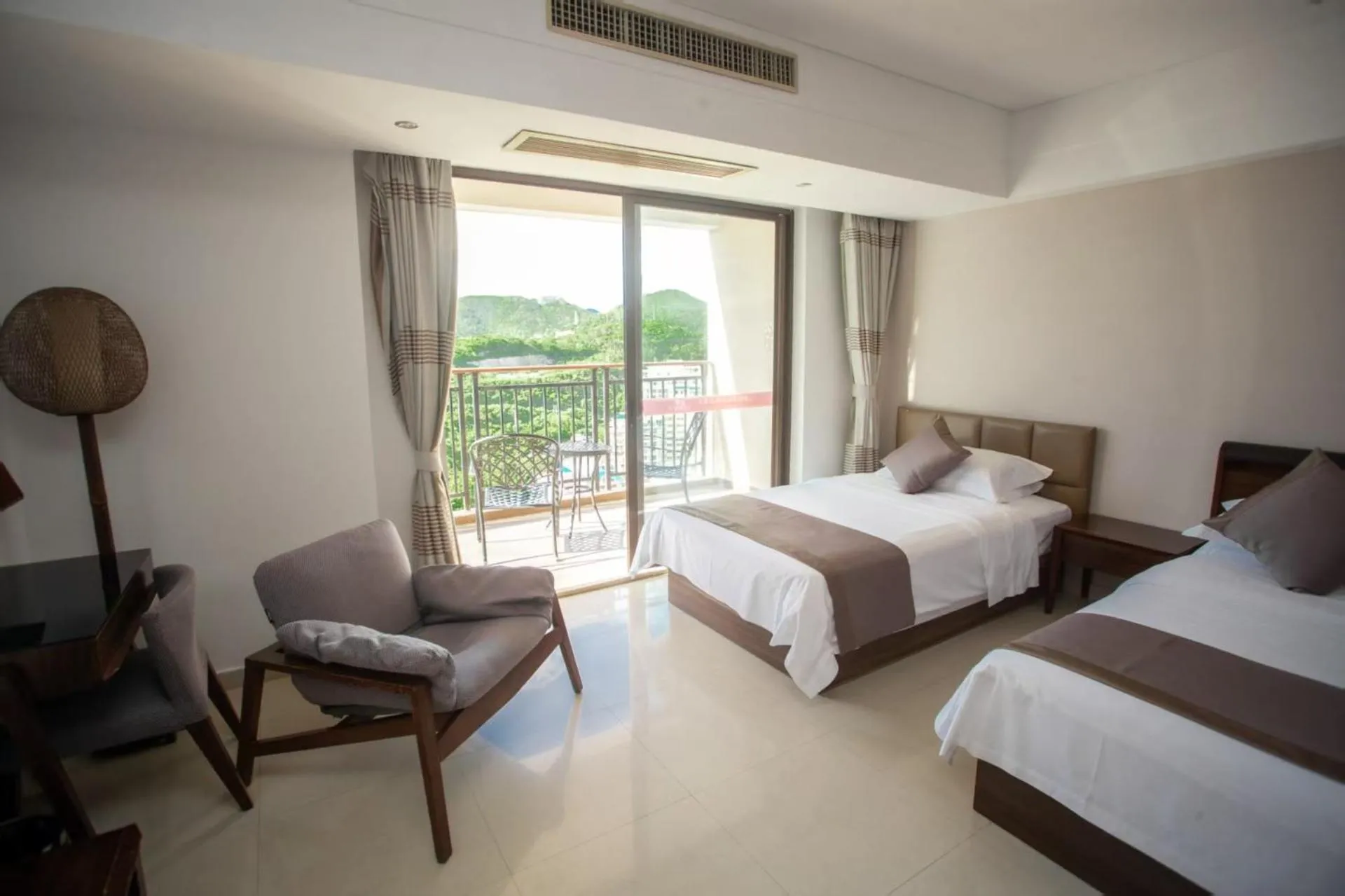 View (from property/room), Bed in Sanya Xintai Seaview Hotel