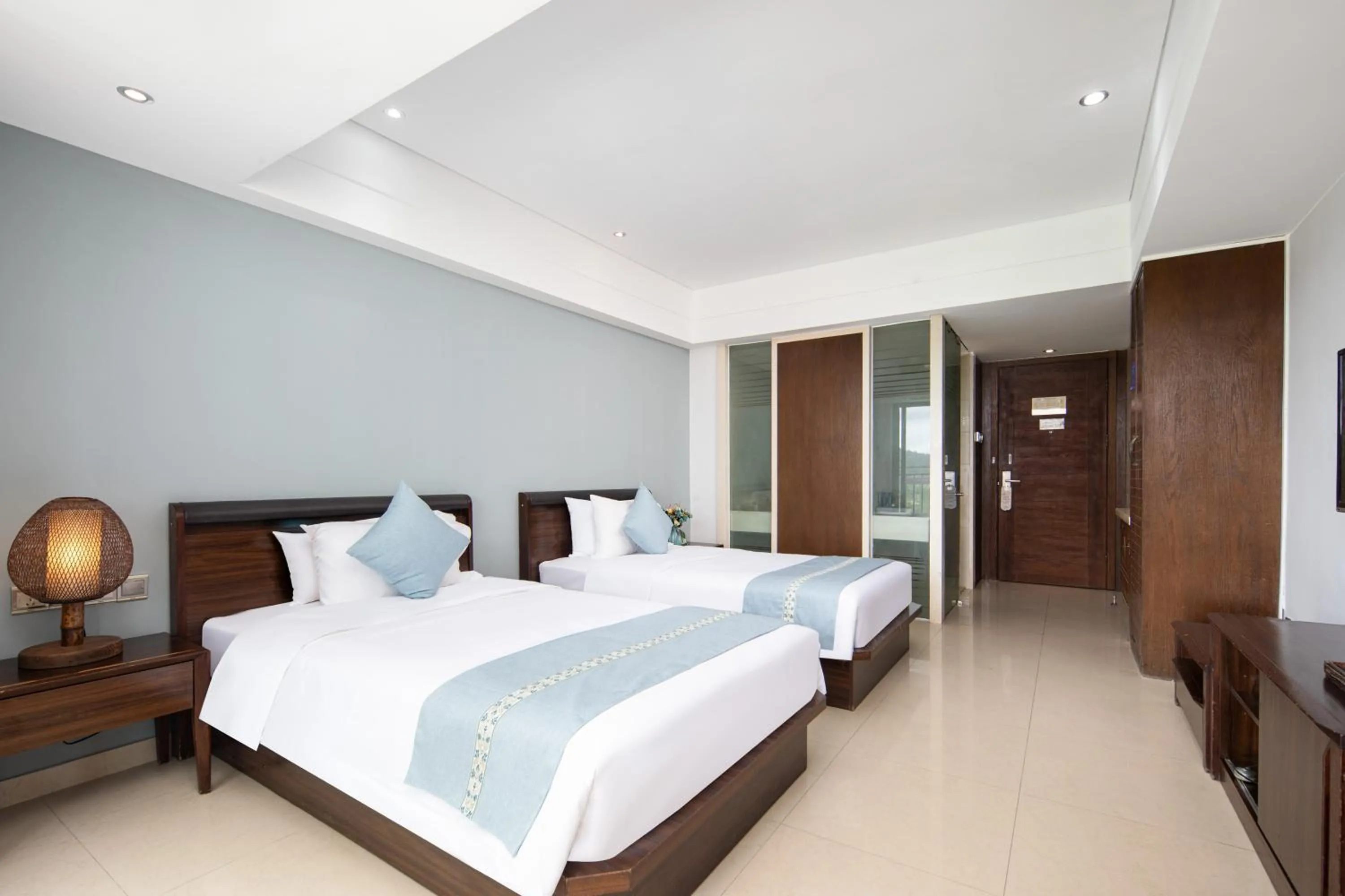 Photo of the whole room, Bed in Sanya Xintai Seaview Hotel