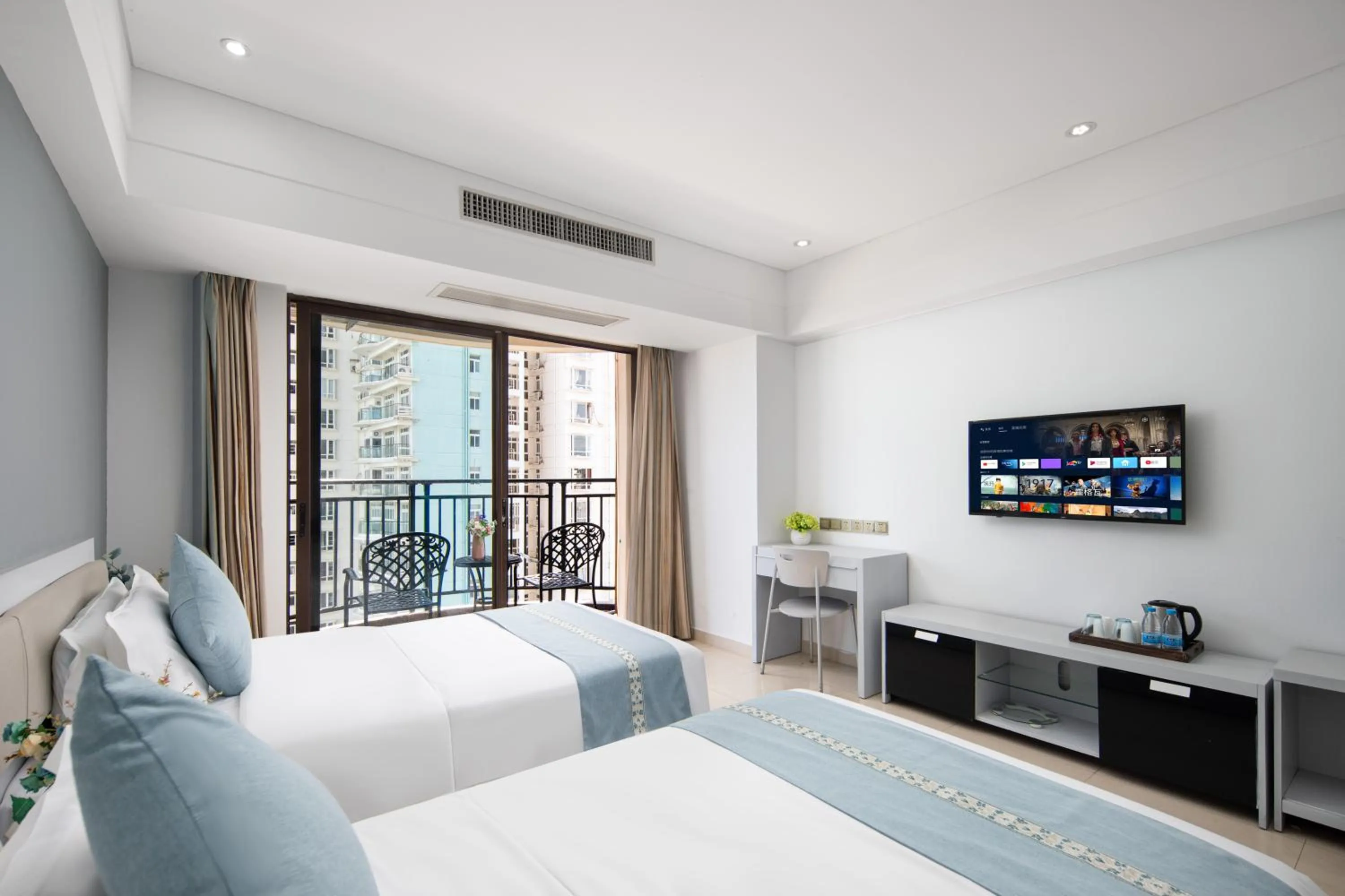 Photo of the whole room, Bed in Sanya Xintai Seaview Hotel