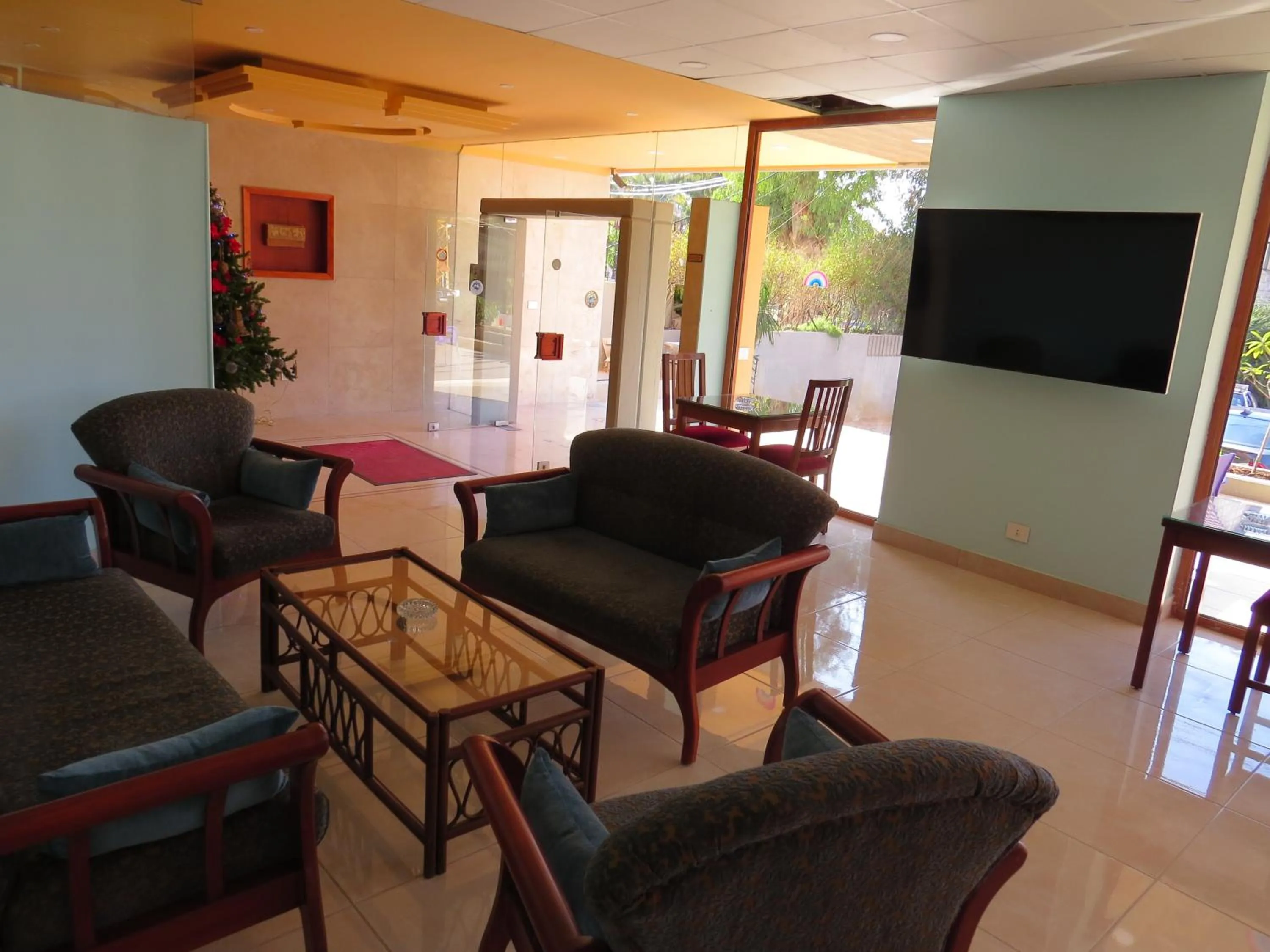 Communal lounge/ TV room in La Tourelle
