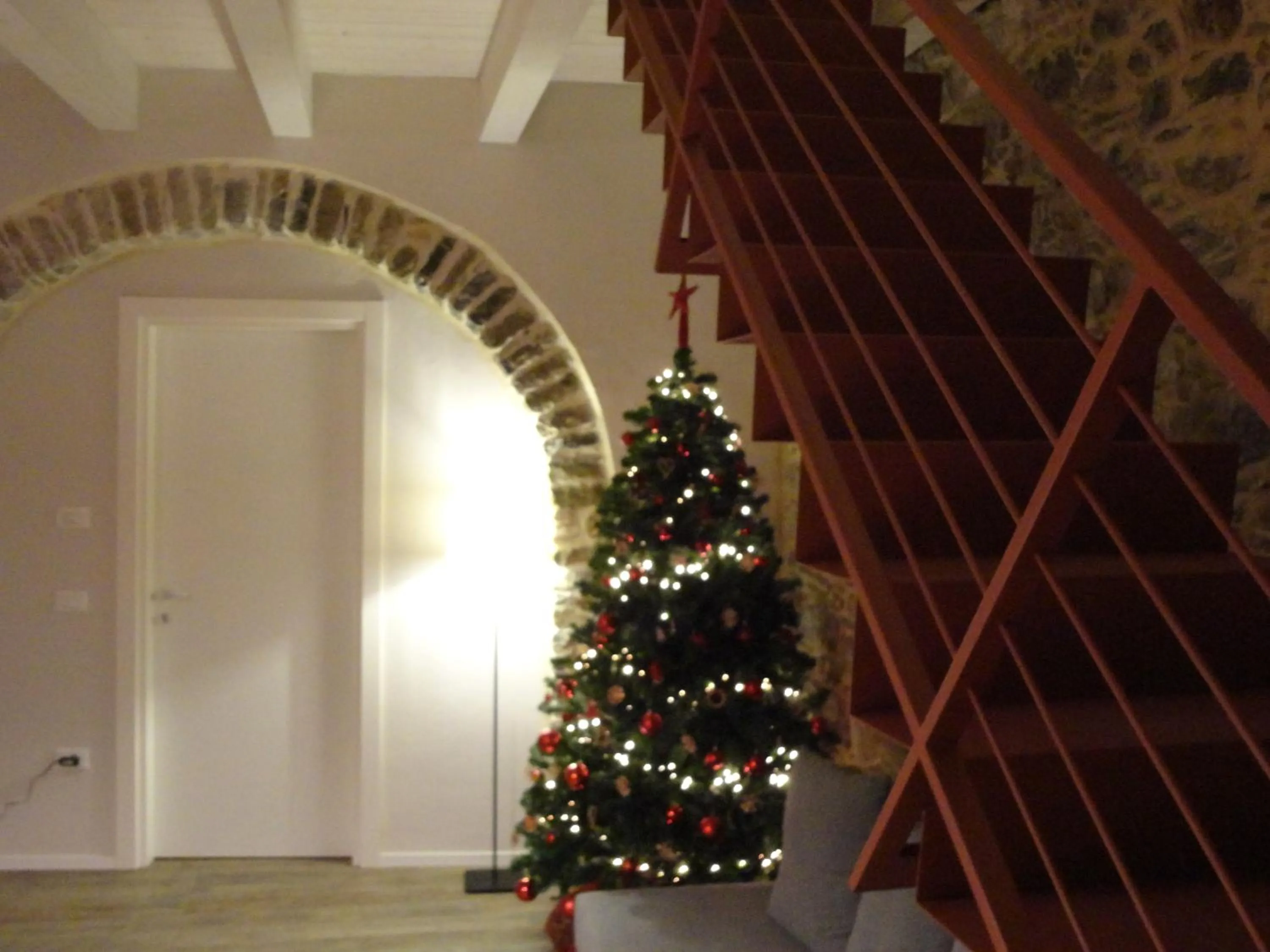 Communal lounge/ TV room in Il Giglio Casa Albergo