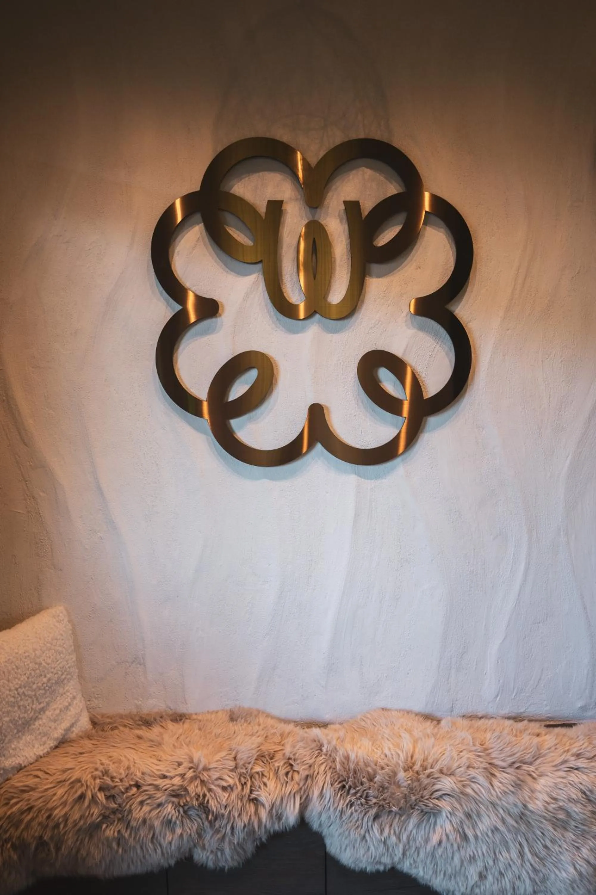 Decorative detail, Bed in Alpine Boutique Hotel wollée