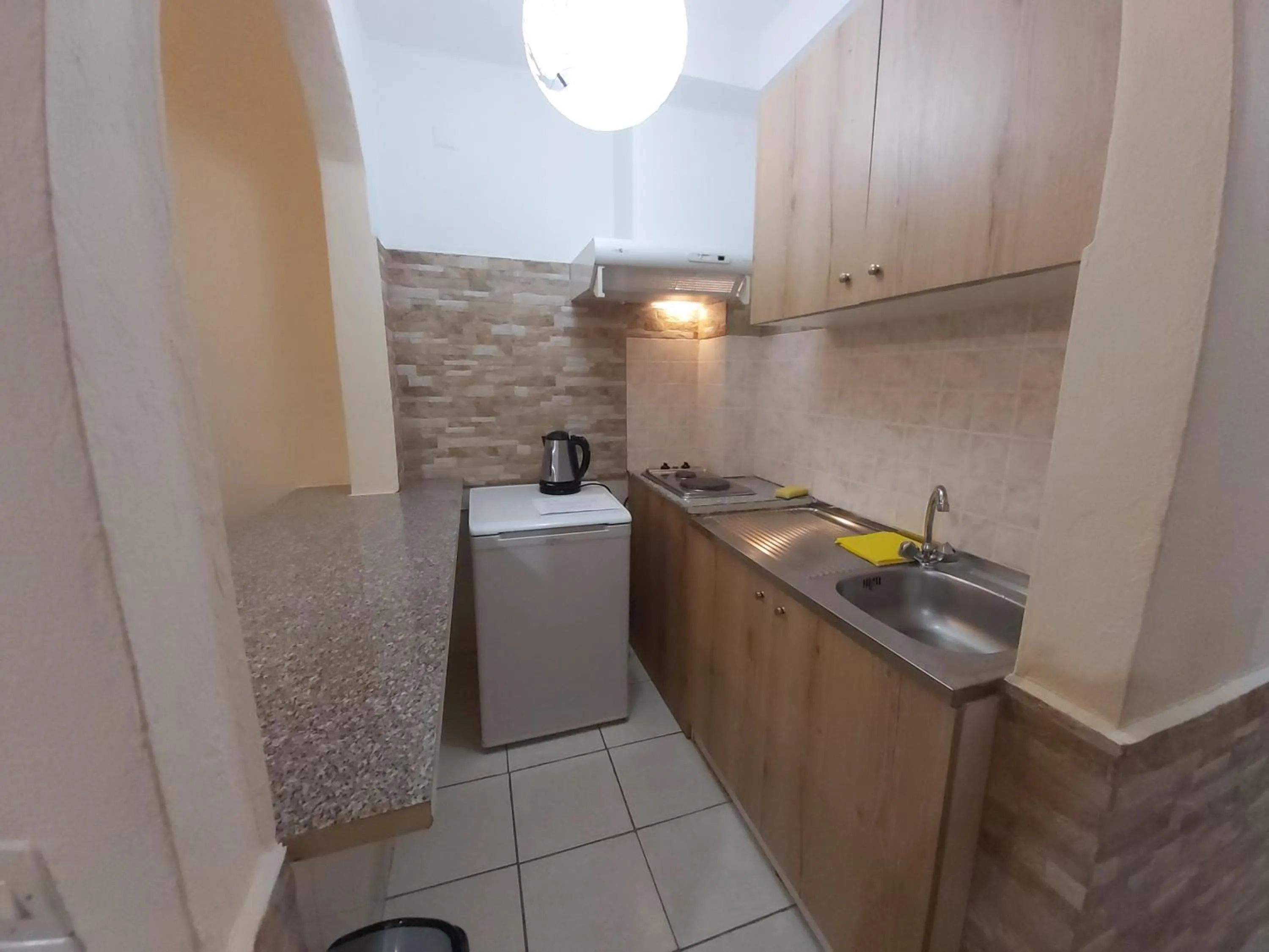 Kitchen or kitchenette in Flamingo Apartments Moraitika Corfu