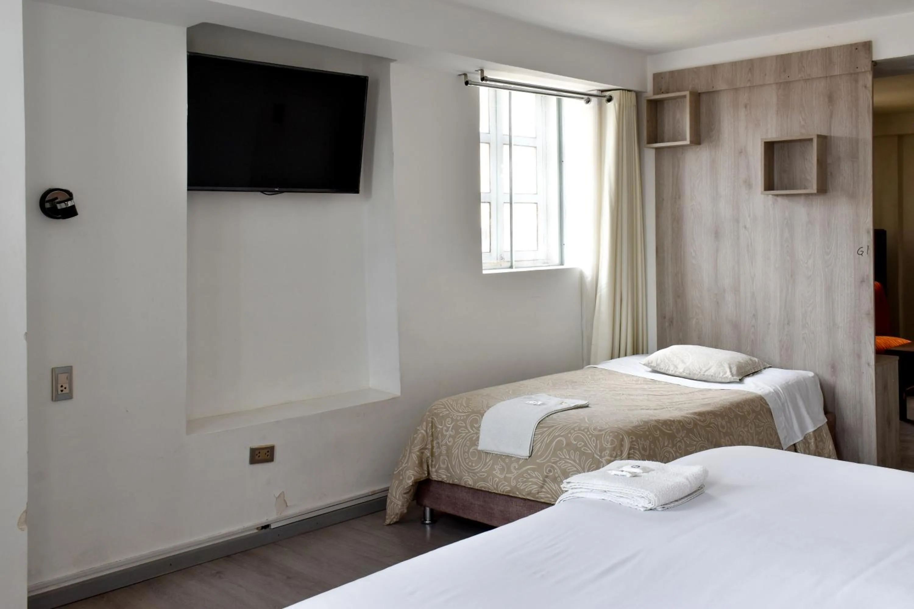 Bed in Apart Hotel El Puma