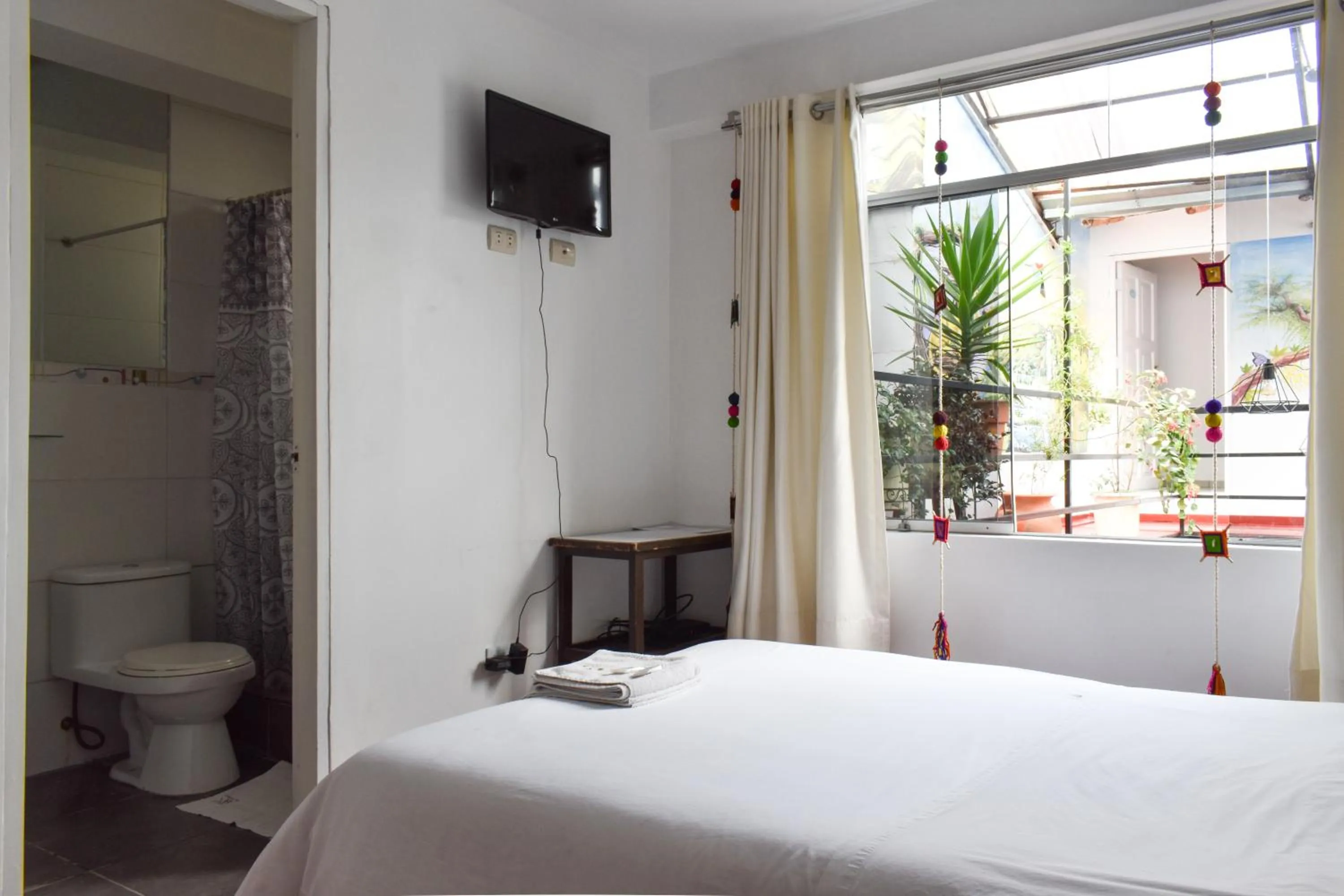 Bed in Apart Hotel El Puma