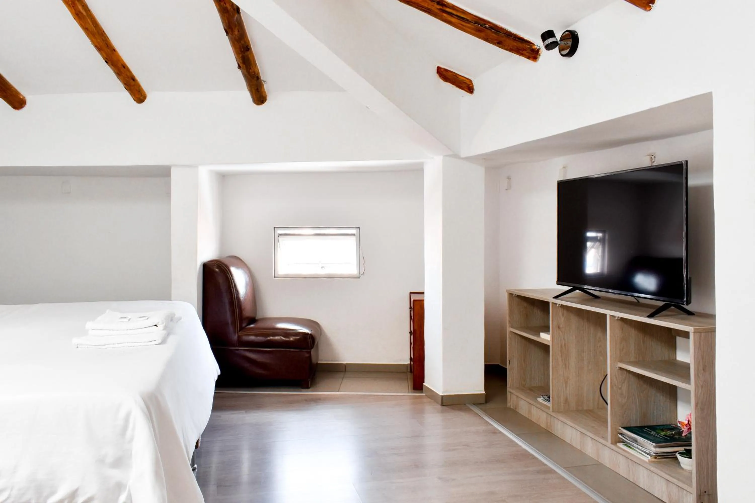 Bed in Apart Hotel El Puma