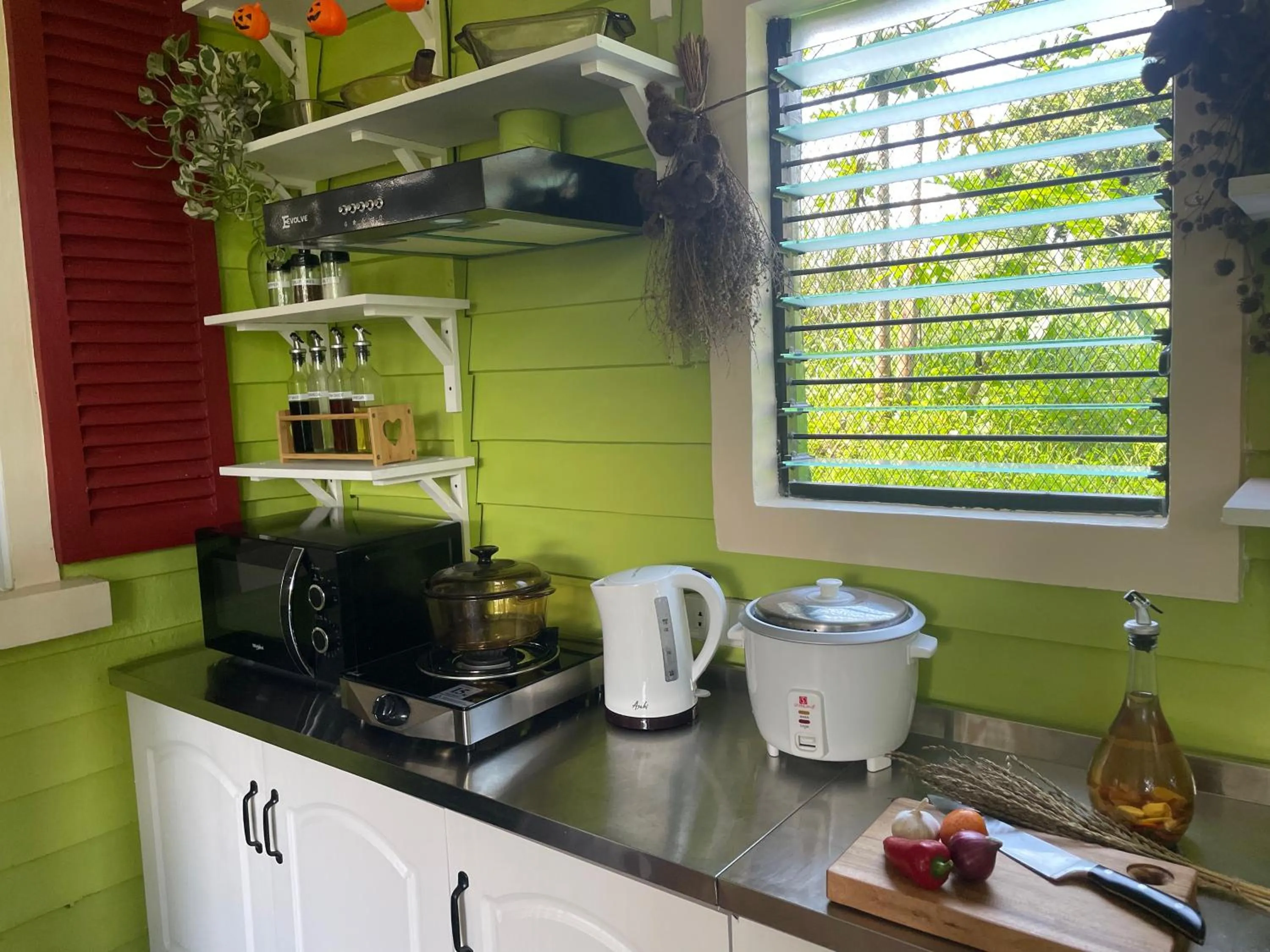 Kitchen or kitchenette in Madie's Place B&B with Private Pool in Santa Rosa near Enchanted Kingdom