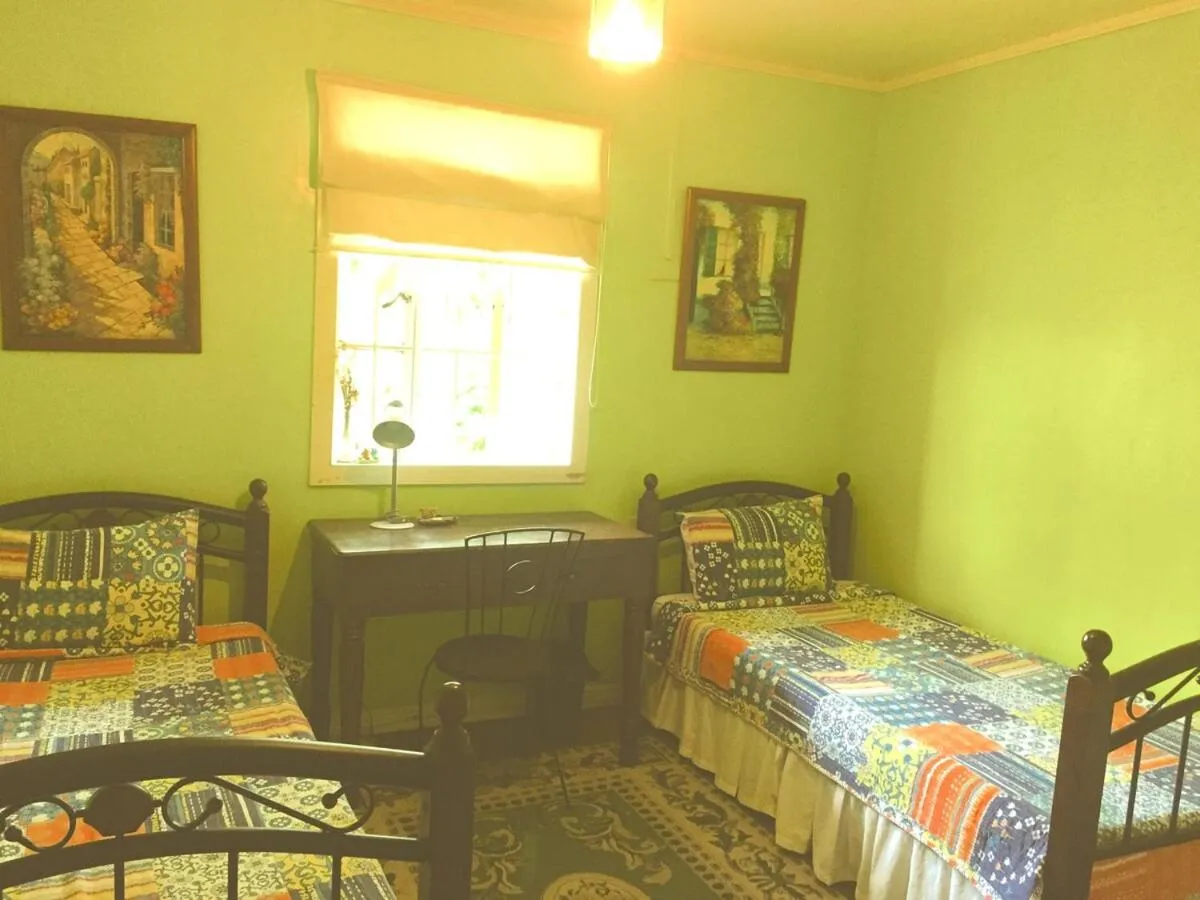 Bed in Madie's Place B&B with Private Pool in Santa Rosa near Enchanted Kingdom