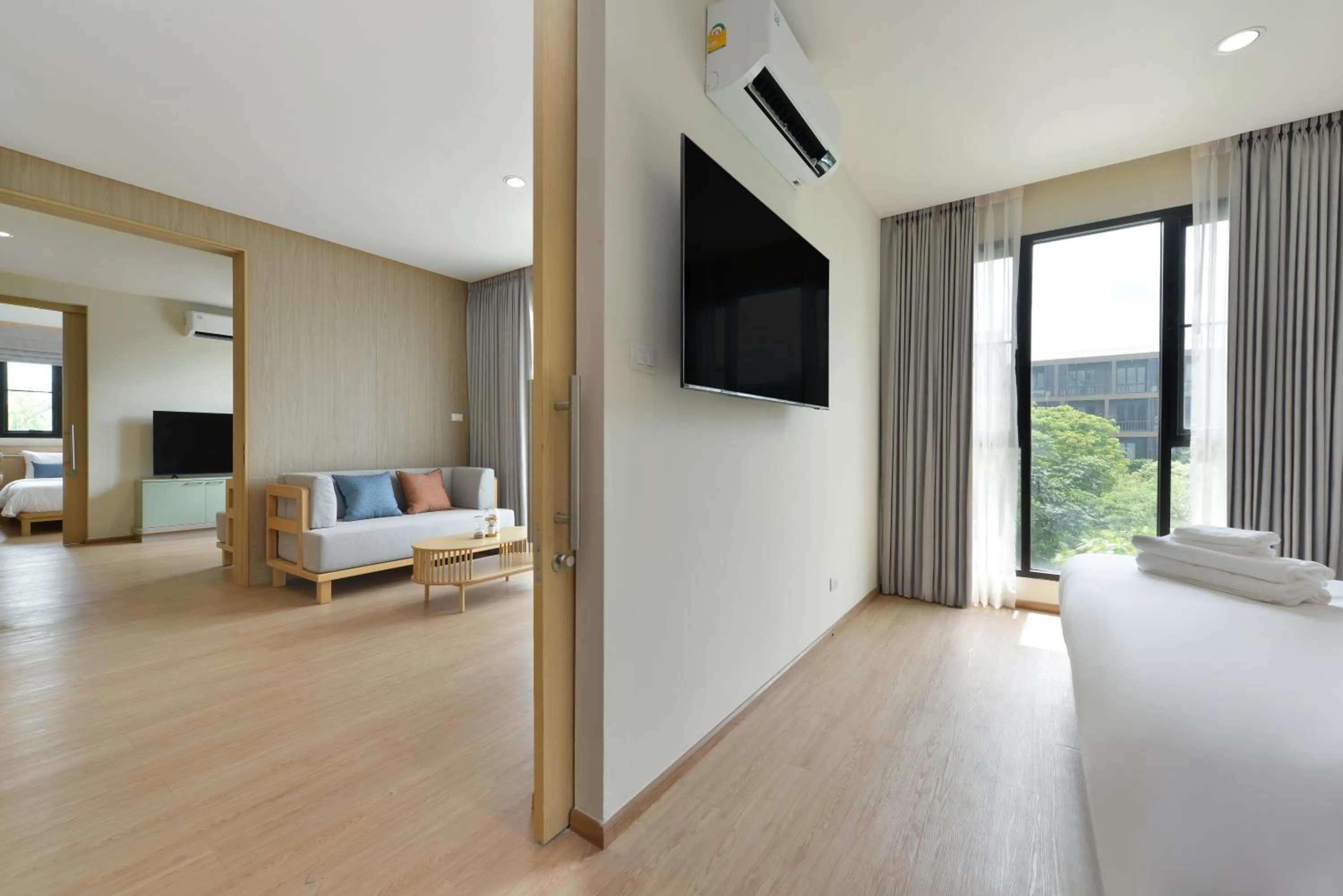 Living room, Bed in SENS Hotel