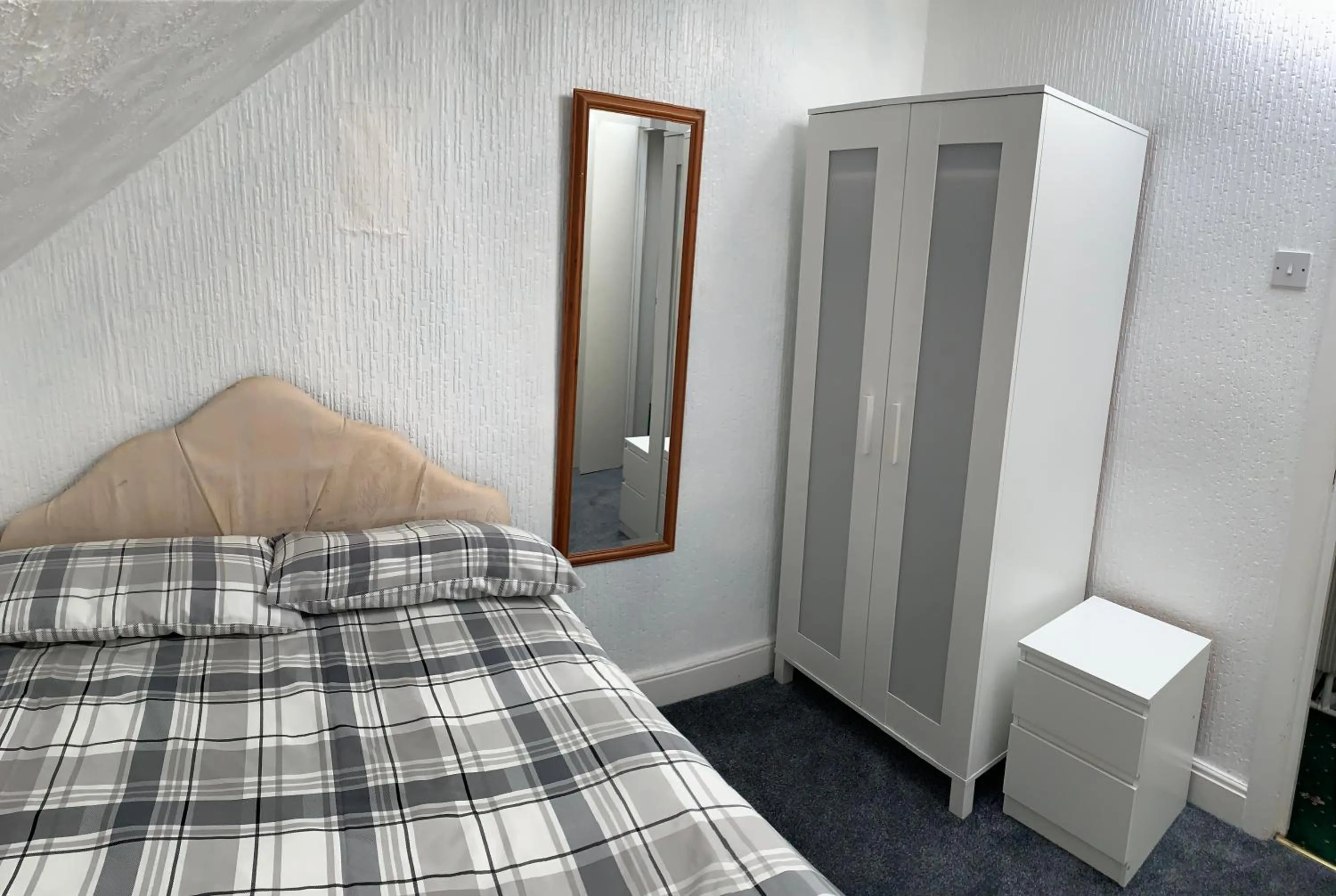 Bed in Beeton Villas Holiday Apartments