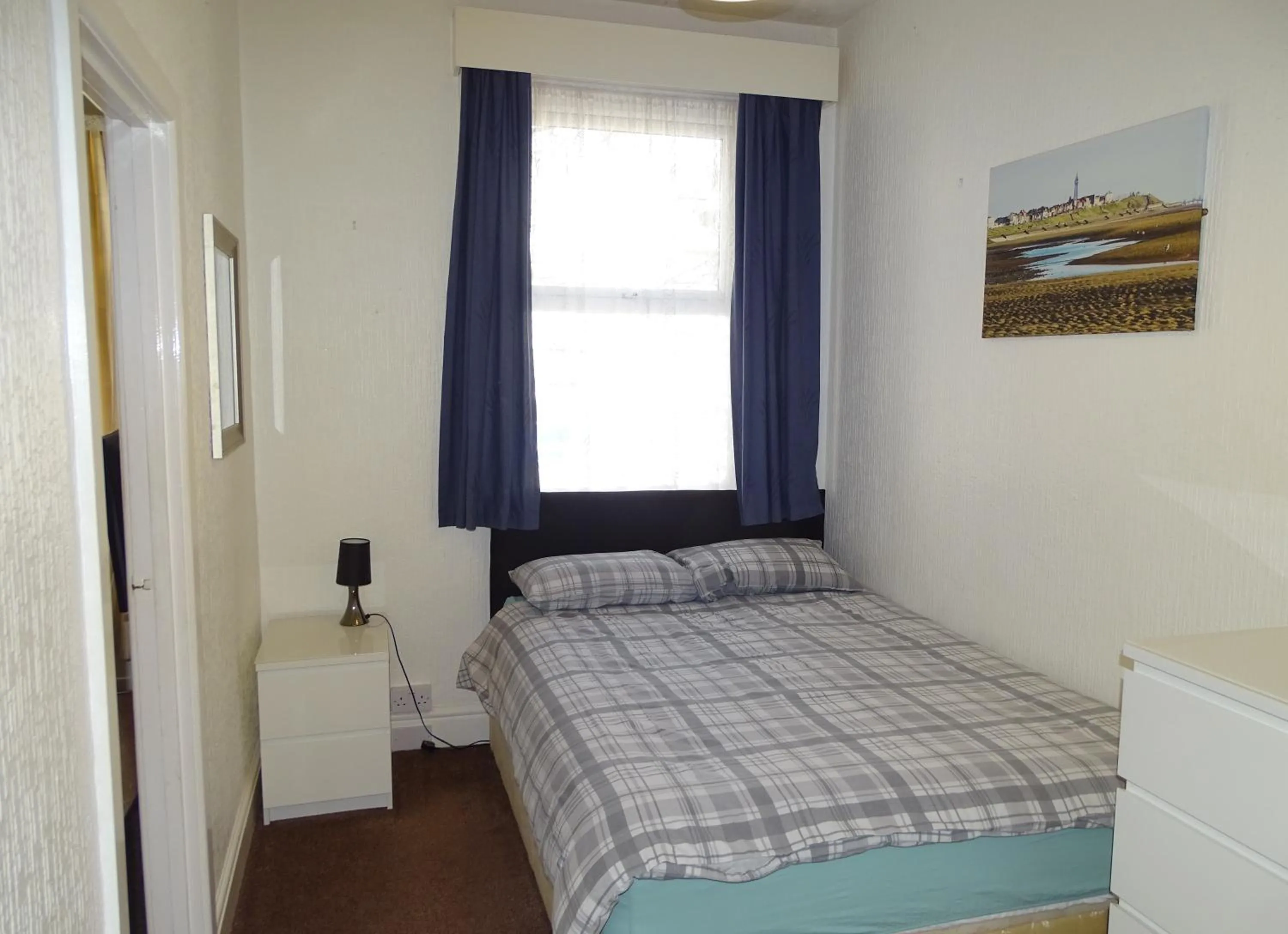 Bed in Beeton Villas Holiday Apartments
