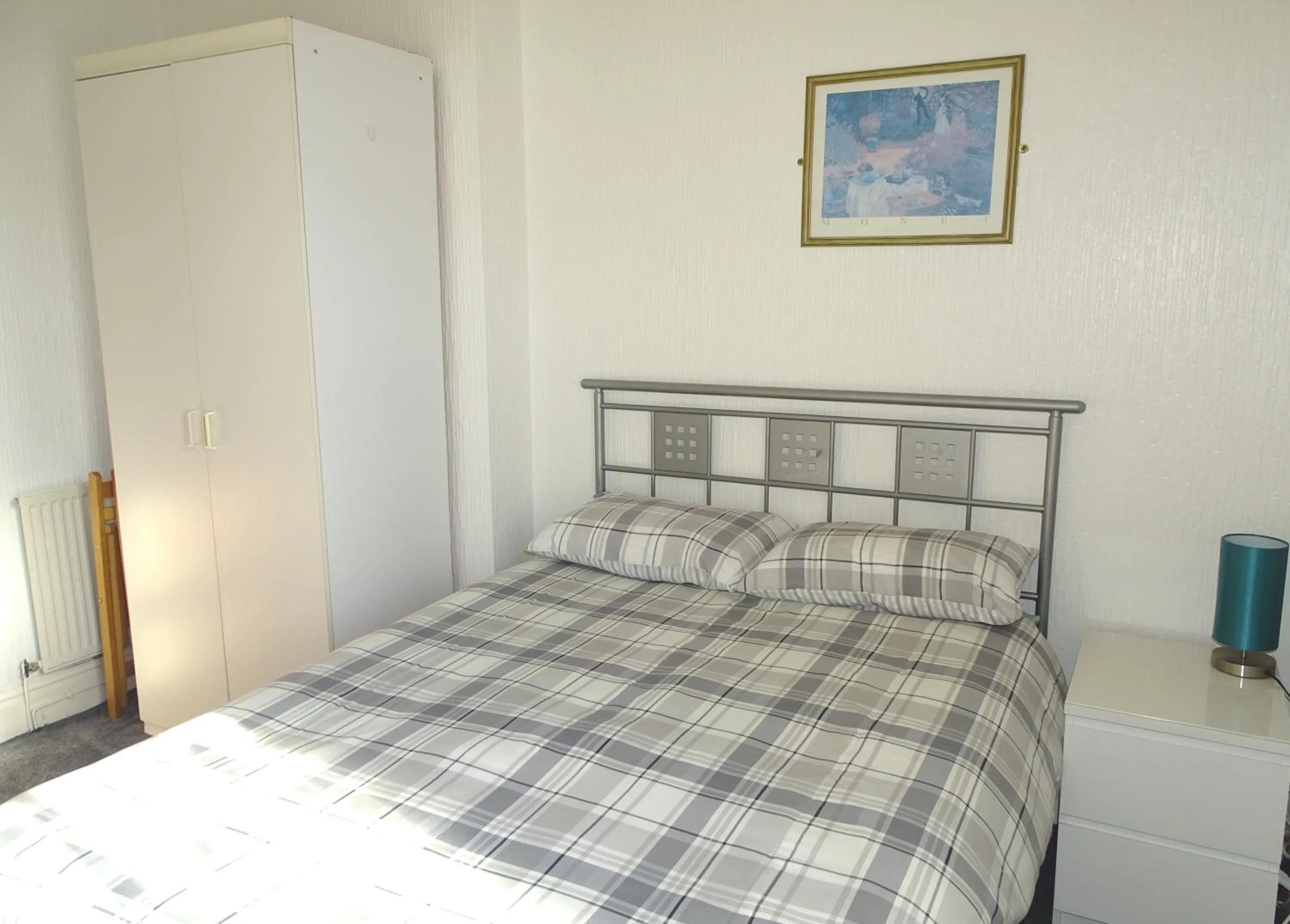 Bed in Beeton Villas Holiday Apartments