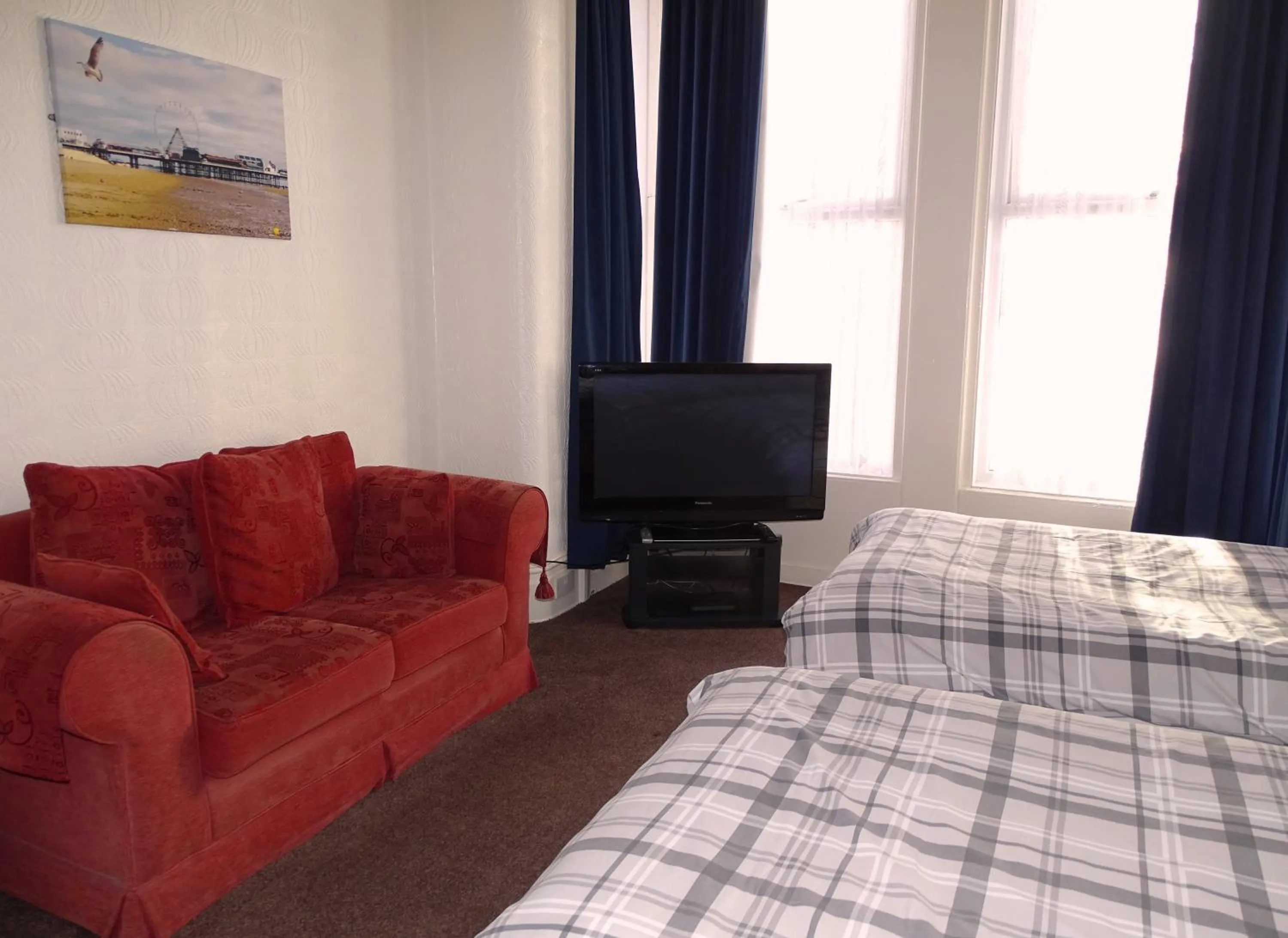 Bed in Beeton Villas Holiday Apartments