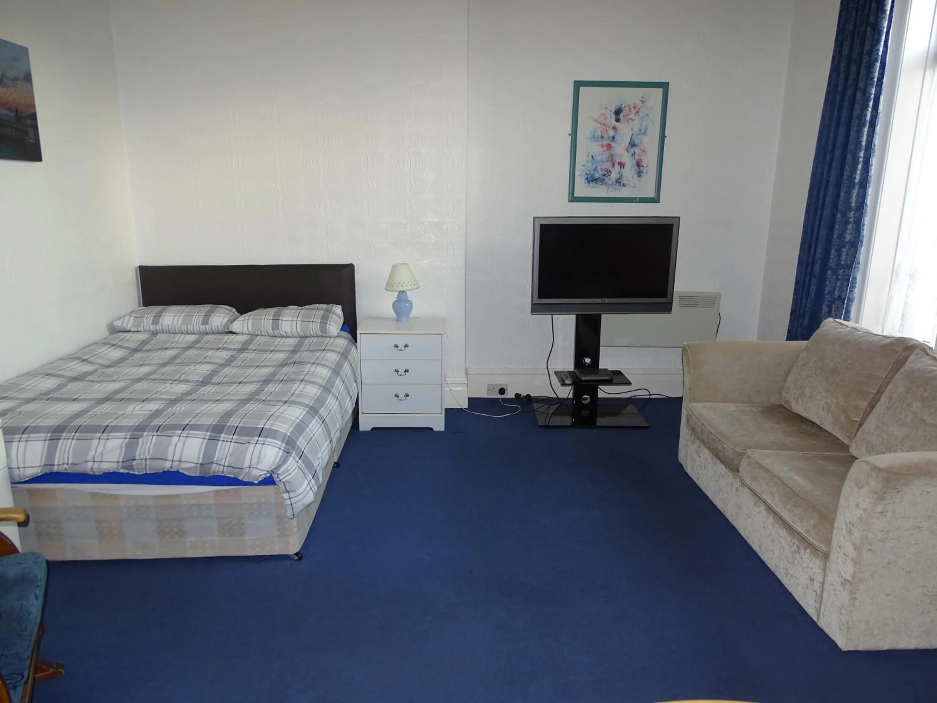 Bed in Beeton Villas Holiday Apartments