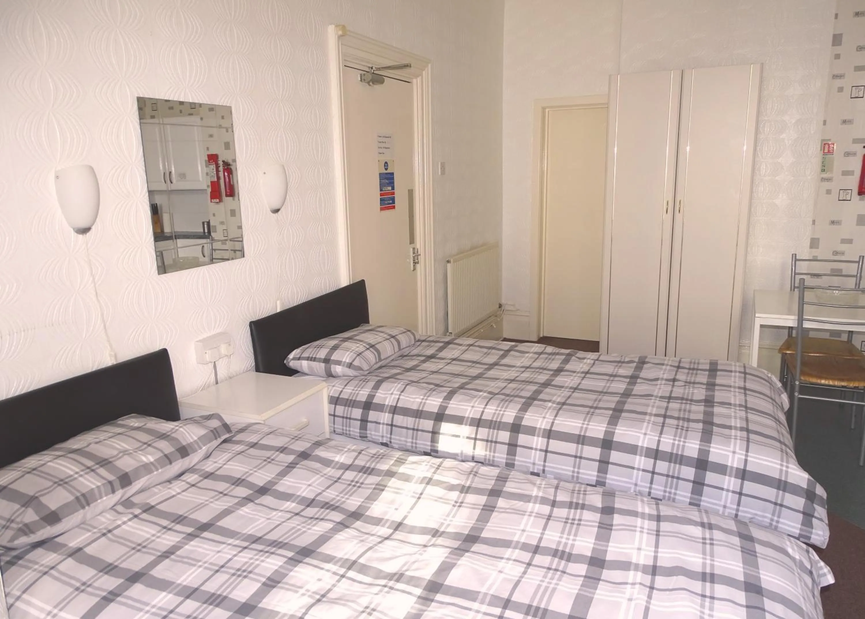 Bed in Beeton Villas Holiday Apartments