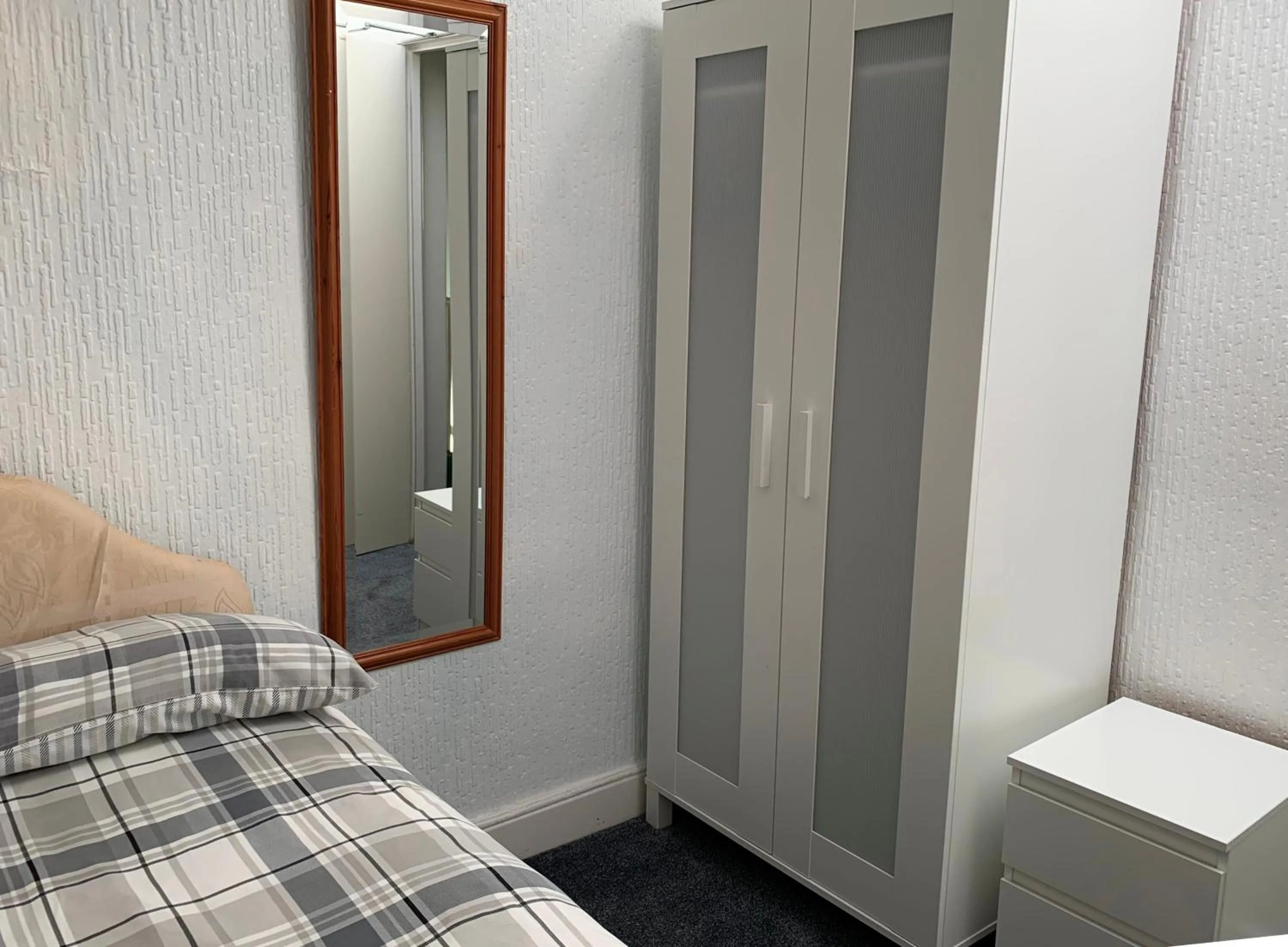 Bed in Beeton Villas Holiday Apartments