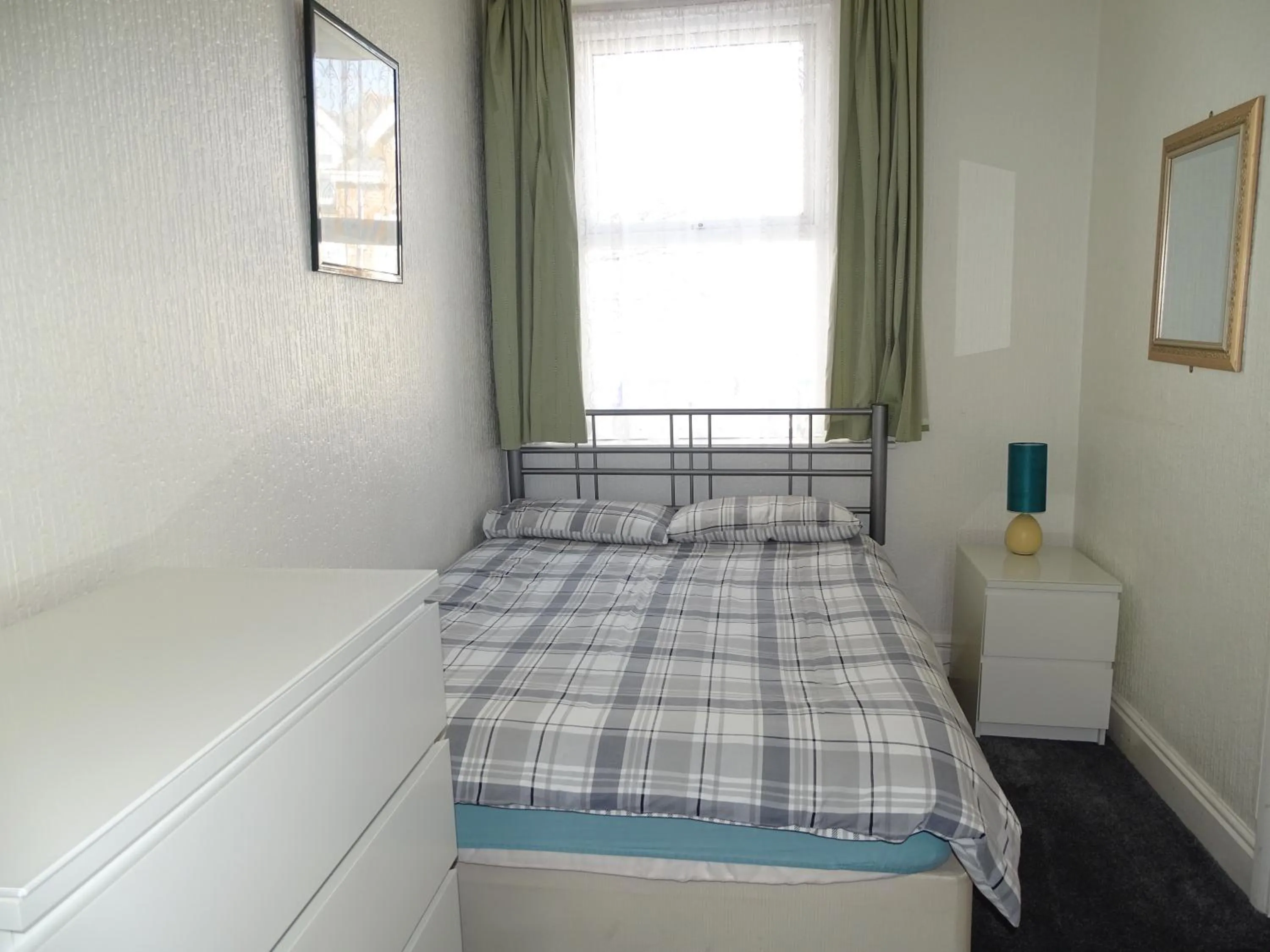 Bed in Beeton Villas Holiday Apartments