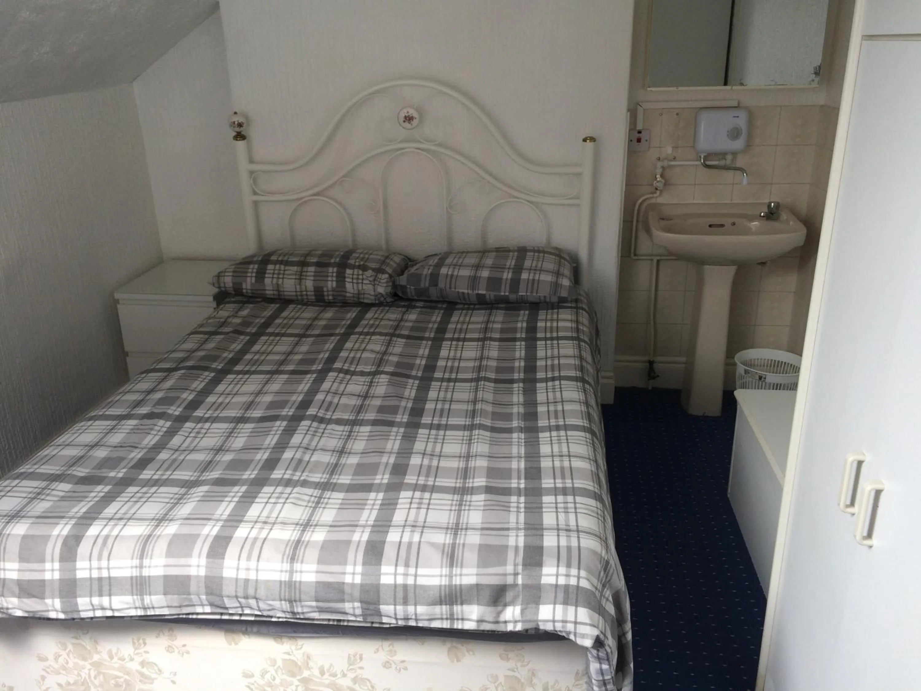Bed in Beeton Villas Holiday Apartments