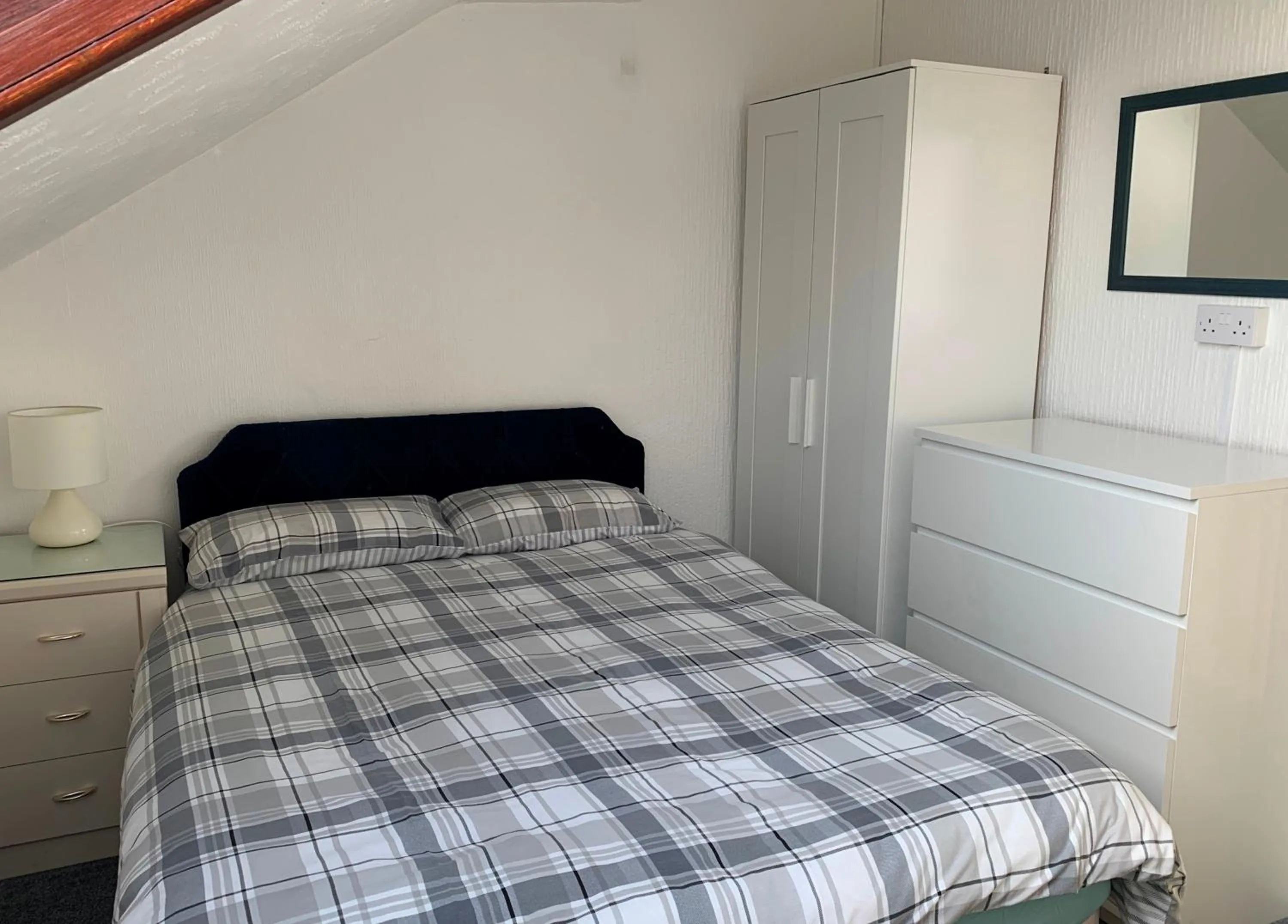 Bed in Beeton Villas Holiday Apartments