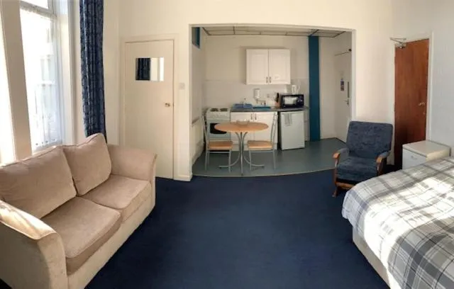Bed in Beeton Villas Holiday Apartments