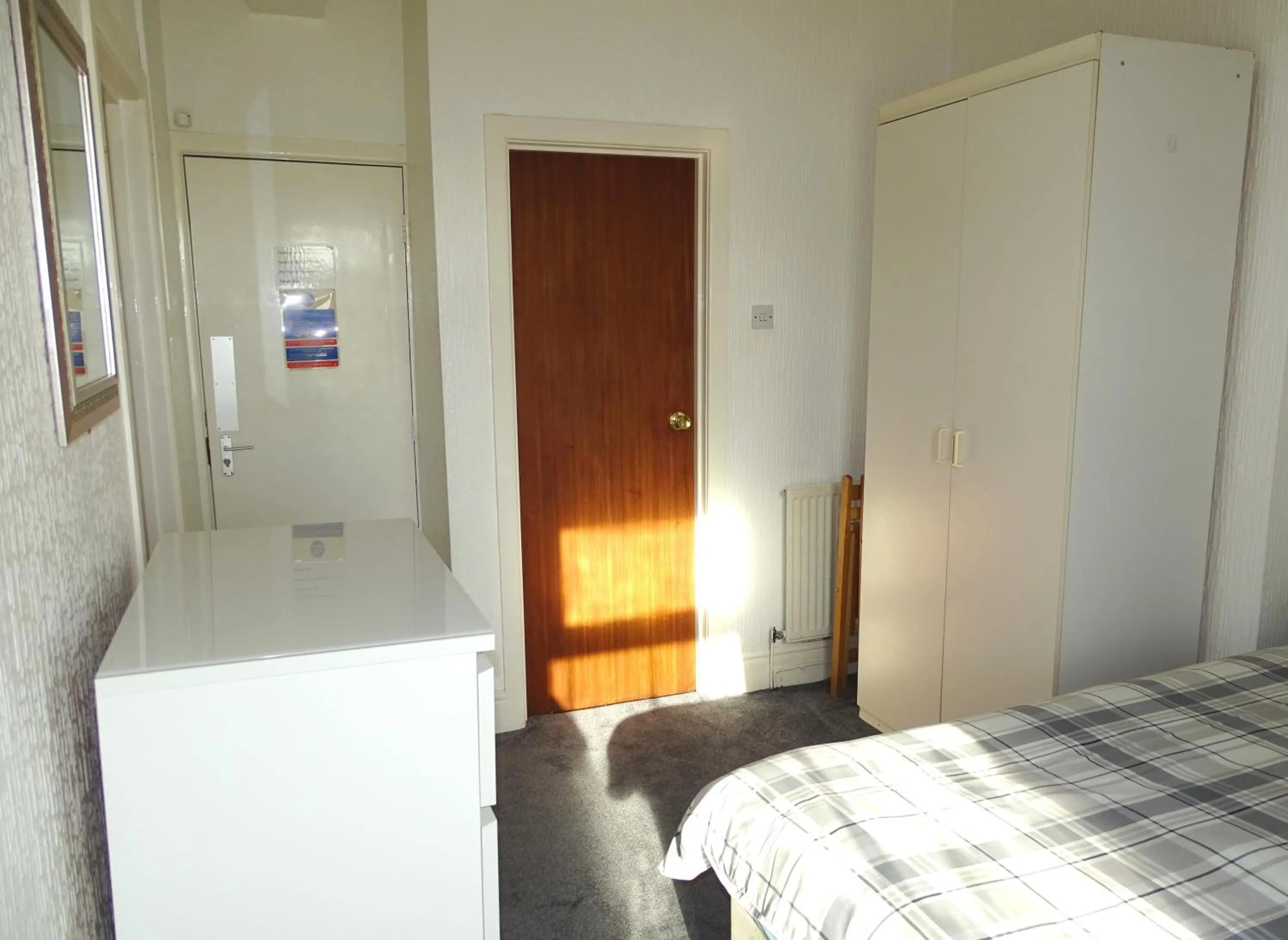 Bed in Beeton Villas Holiday Apartments