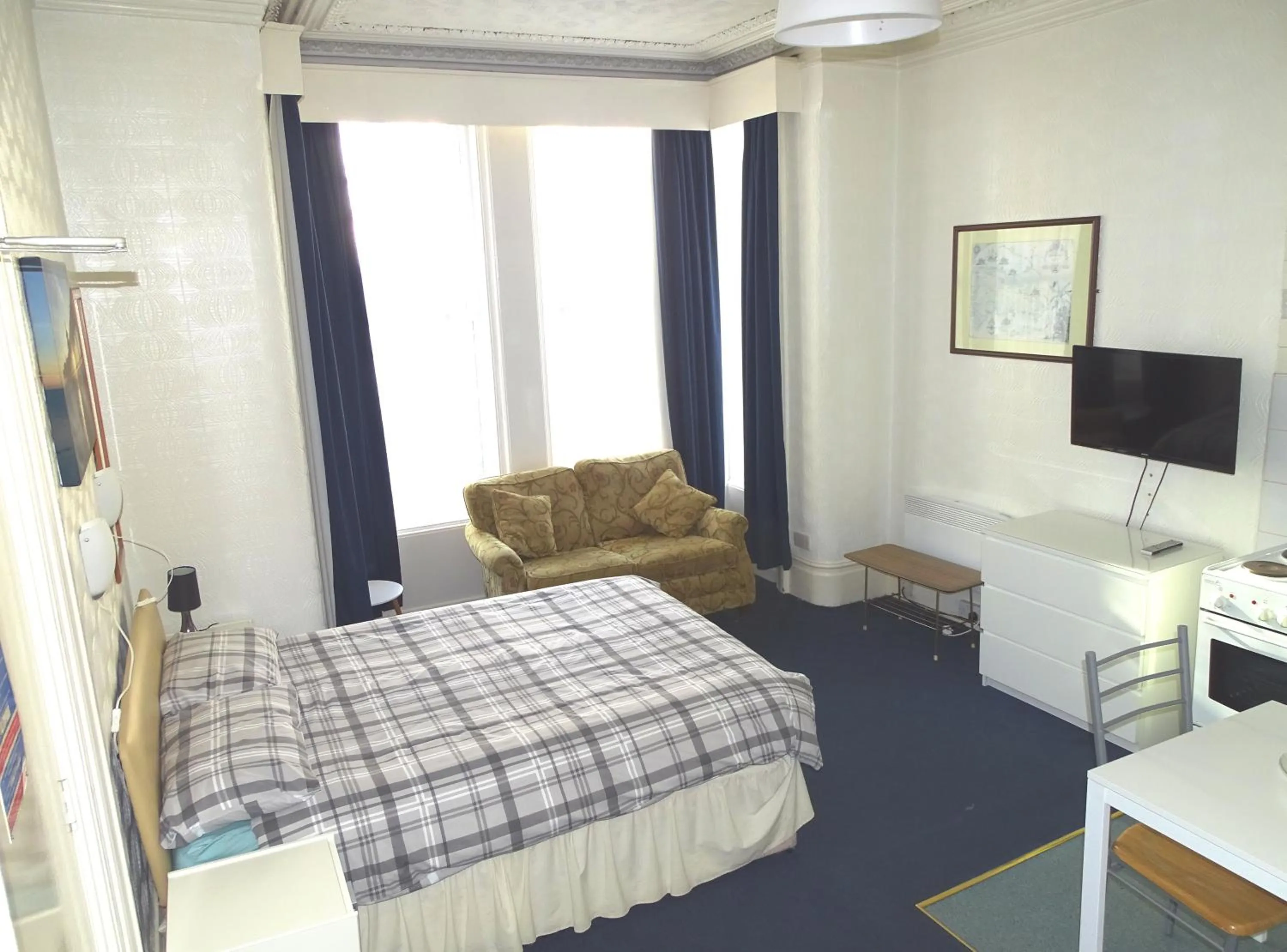 Bed in Beeton Villas Holiday Apartments