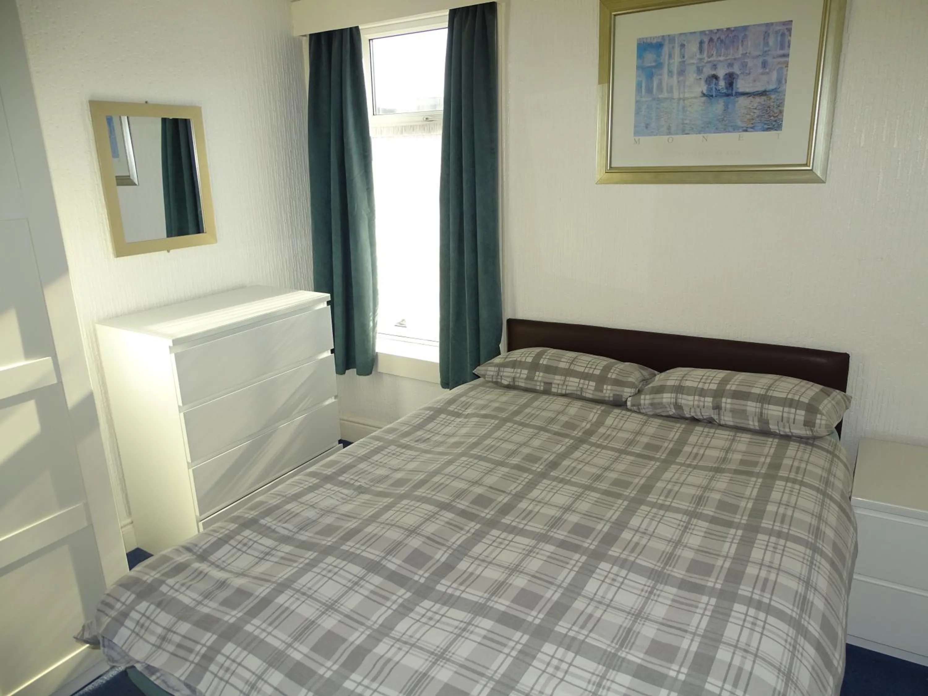 Bed in Beeton Villas Holiday Apartments