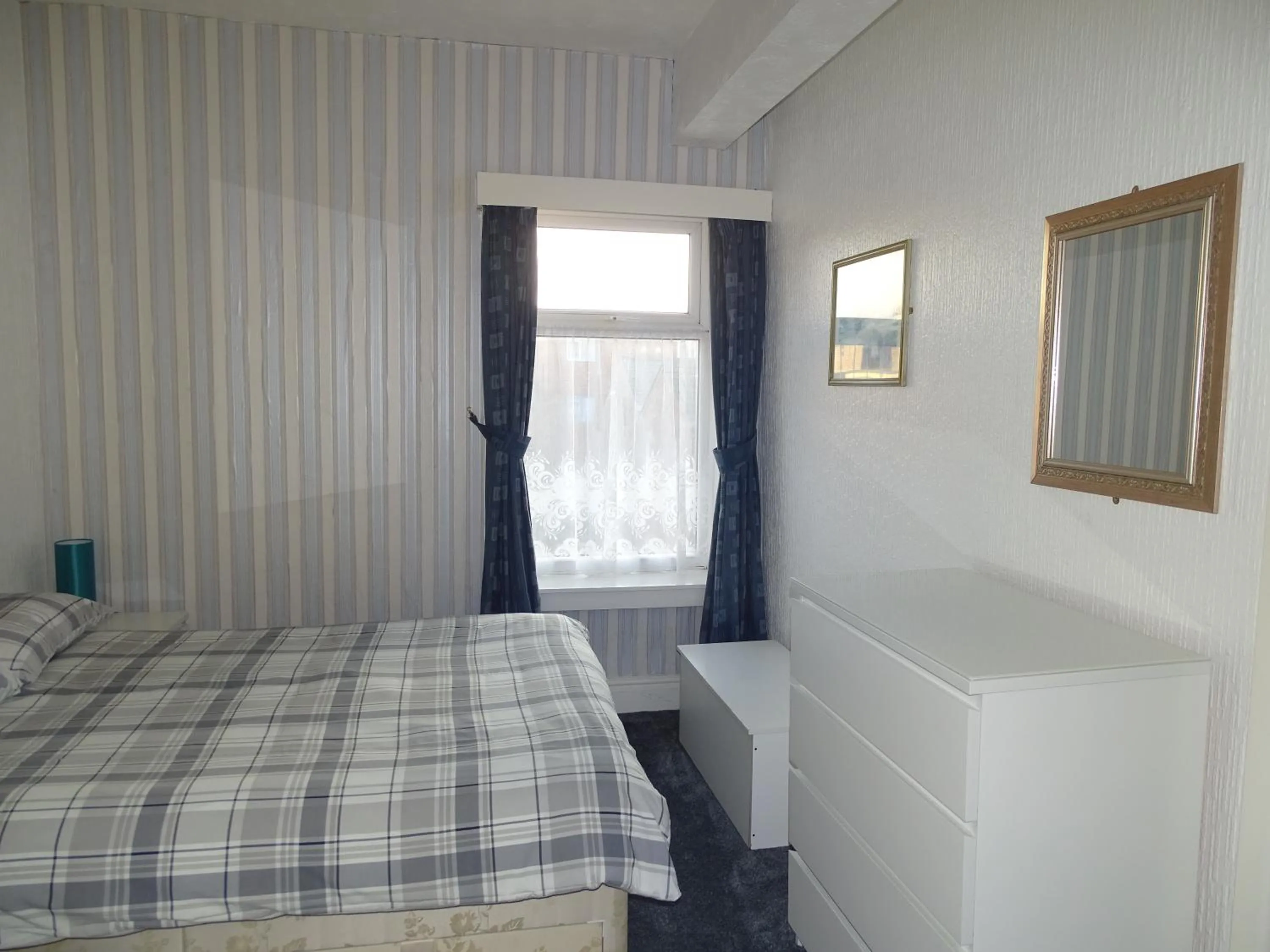 Bed in Beeton Villas Holiday Apartments