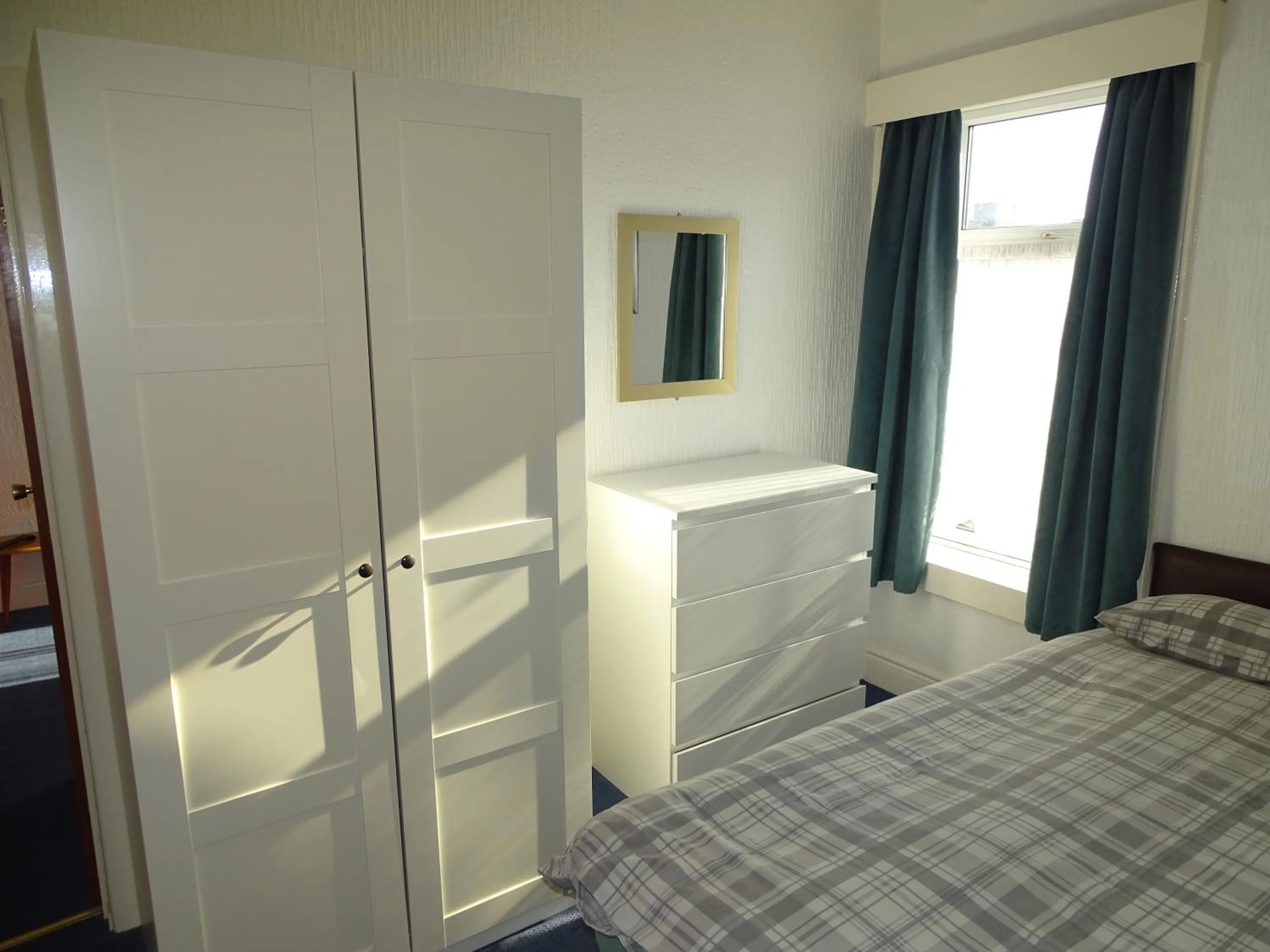 Bed in Beeton Villas Holiday Apartments