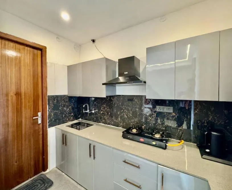 King Room with Balcony in Soothing Stayz - Near Medanta The Medicity