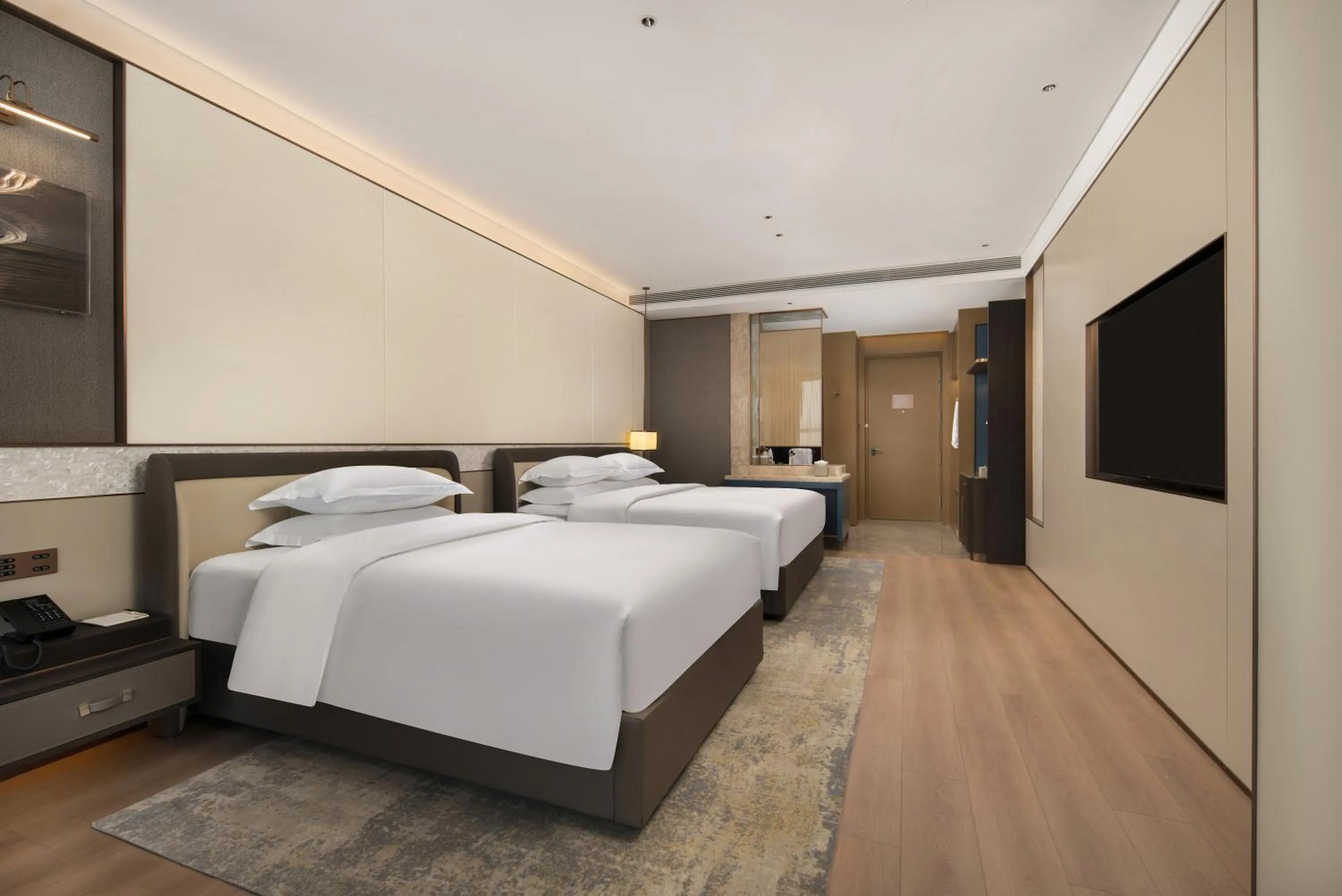 Family Room with One King Bed and One Double Bed, Non-Smoking in Wyndham Garden Urumqi Innovation Square