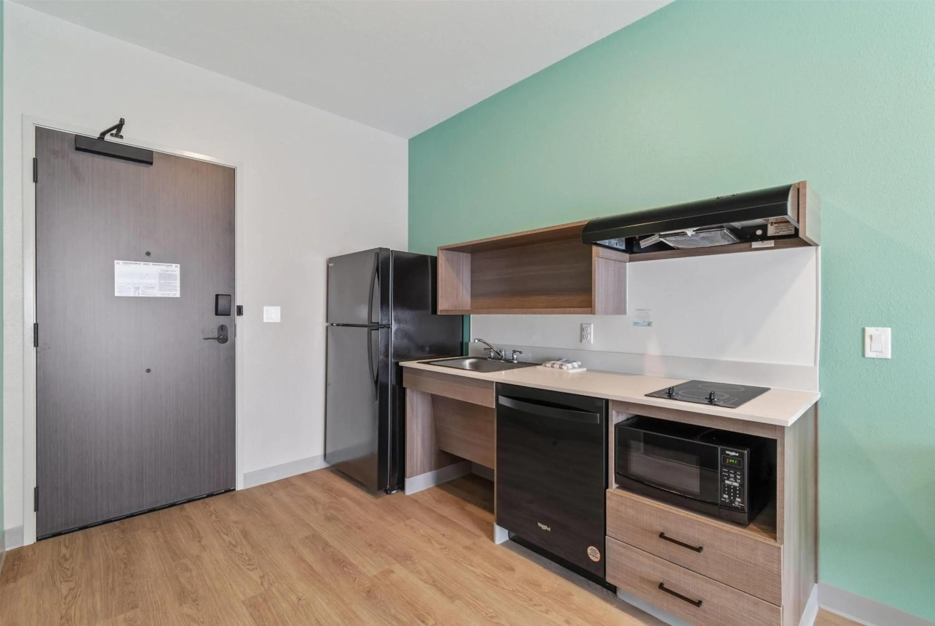 Kitchen or kitchenette in ECHO Suites Extended Stay by Wyndham Houston Katy West